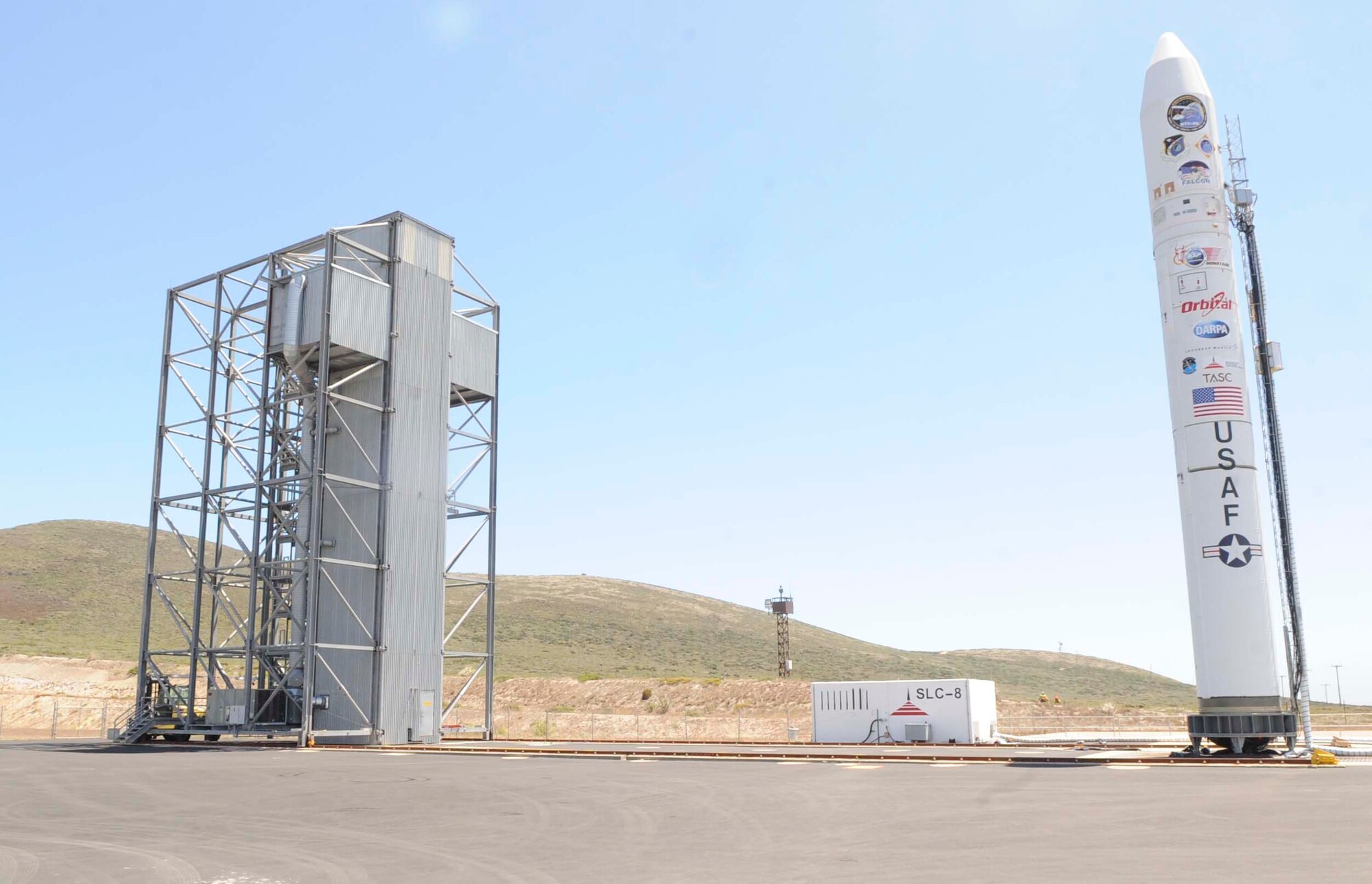VANDENBERG AIR FORCE BASE, Calif. -- A Minotaur IV rocket stands beside Space Launch Complex-8 here Wednesday, Aug. 3, 2011.  The Minotaur IV will carry the HTV-2 scheduled to launch Aug. 10 between 7 a.m. and 1 p.m. (U.S. Air Force photo/Staff Sgt. Scottie McCord)