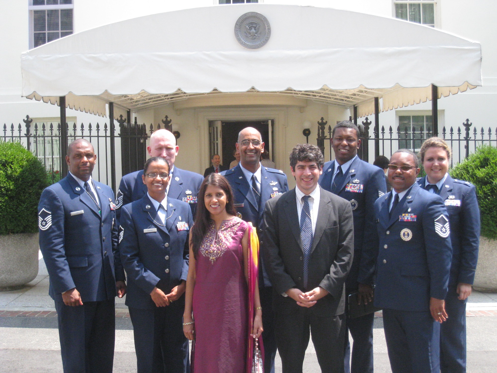 Members and spouses from the 317th Recruiting Squadron led the
military portion of a diversity summit aimed at recognizing the
contributions of South Asian Americans at the White House on July 29-31.
Pictured from left to right are: Master Sgt. Donald Day, Master Sgt. Patrick
Schoop, Master Sgt. Roopa Schoop, Uma Chaudhary, Lt. Col Ravi Chaudhary
(commander), Aurn Chaudhary, Staff Sgt. Leonard Crowley, Master Sgt. Michael
Barnhill and Capt. Allison Suter. (U.S. Air Force Photo/courtesy photo)
