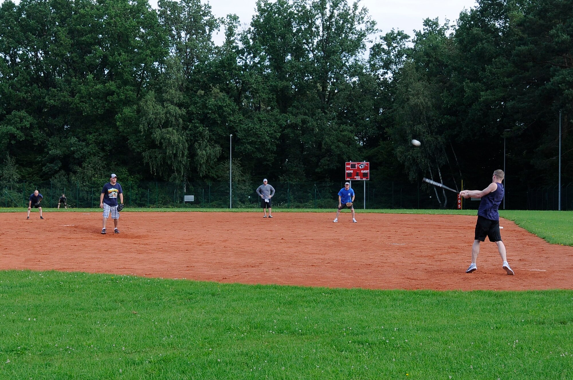 U.S. Air Force members of the 435th Air Ground Operations Wing participate in a game of baseball during the annual AGOW sports day, Palaski Barracks, Germany, Aug. 3, 2011. The sports day was an opportunity for members of AGOW to get to know one other outside the work place and build camaraderie throughout the wing. (U.S. Air Force photo by Airman 1st Class Kendra Alba)