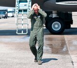 Col. Robert Swain Jr., 439th Airlift Wing commander, flew his final C-5 mission Aug. 3. Dozens of onlookers awaited the conclusion of the commander's fini flight, including his wife, Diane Swain, who used a large hose from the Westover Fire Department to douse her husband shortly after he stepped down the crew ladder from the C-5. The fini flight adds to the colonel's more than 3,500 hours flying C-5s and A-10s -- including 51 combat missions over Southwest Asia. Swain is the first pilot to score an air-to-air kill in an A-10 Thunderbolt II, when he downed an Iraqi helicopter during Operation Desert Storm. He will relinquish command of the 439th AW Aug. 6 to Col. Steven Vautrain. (US Air Force photo/W.C.pope)
