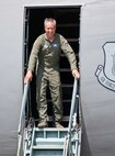 Col. Robert Swain Jr., 439th Airlift Wing commander, flew his final C-5 mission Aug. 3. Dozens of onlookers awaited the conclusion of the commander's fini flight, including his wife, Diane Swain, who used a large hose from the Westover Fire Department to douse her husband shortly after he stepped down the crew ladder from the C-5. The fini flight adds to the colonel's more than 3,500 hours flying C-5s and A-10s -- including 51 combat missions over Southwest Asia. Swain is the first pilot to score an air-to-air kill in an A-10 Thunderbolt II, when he downed an Iraqi helicopter during Operation Desert Storm. He will relinquish command of the 439th AW Aug. 6 to Col. Steven Vautrain. (US Air Force photo/W.C.pope)