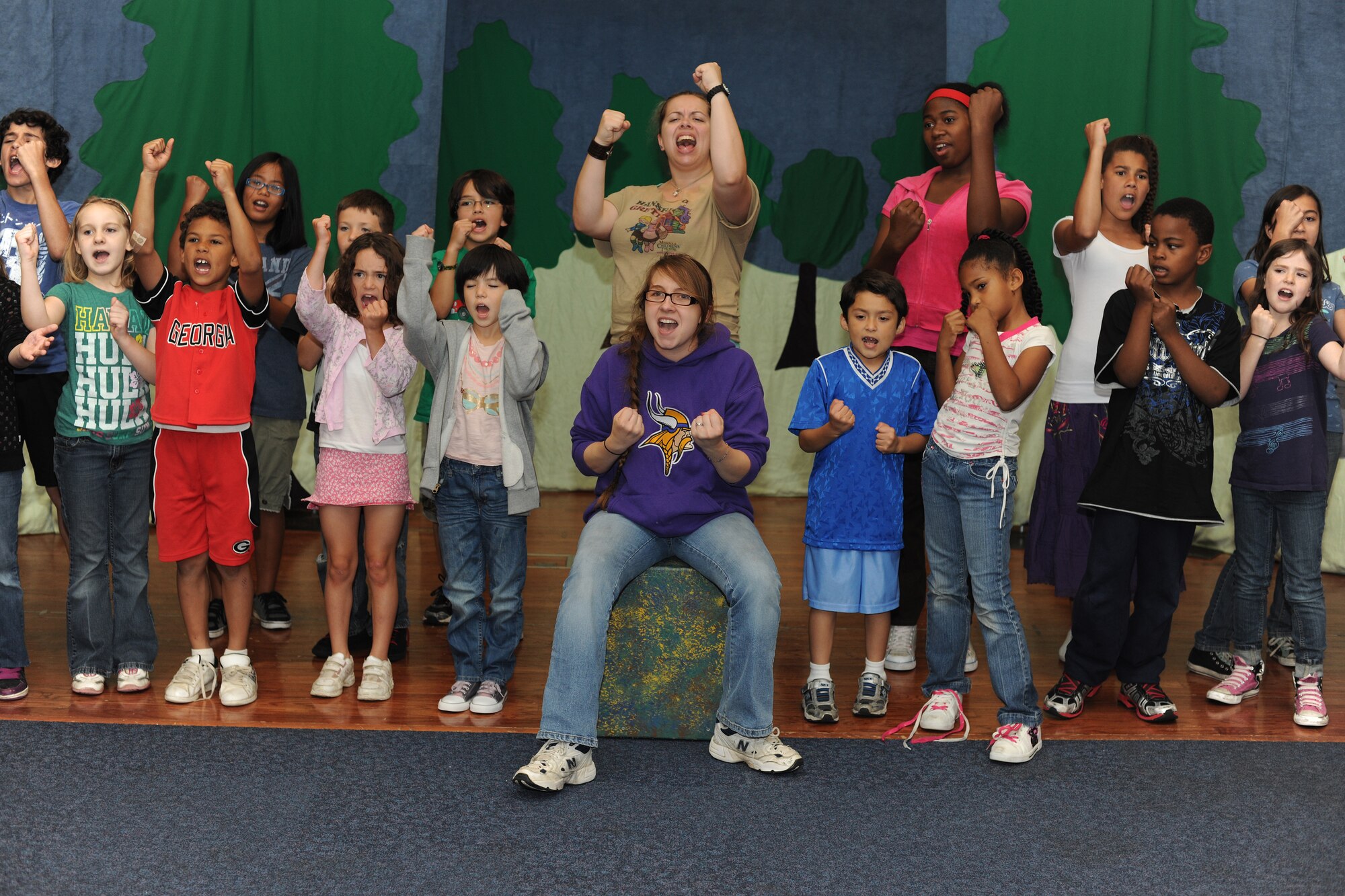 RAF CROUGHTON, United Kingdom - Children practice for their upcoming performance of King Arthur’s Quest at the RAF Croughton Community Center Aug. 6 at 3 p.m. The show is put on by the Missoula Children's Theatre, which prepares the children in one week to perform an entire musical production in front of an audience. (U.S. Air Force photo by Senior Airman Joel Mease)