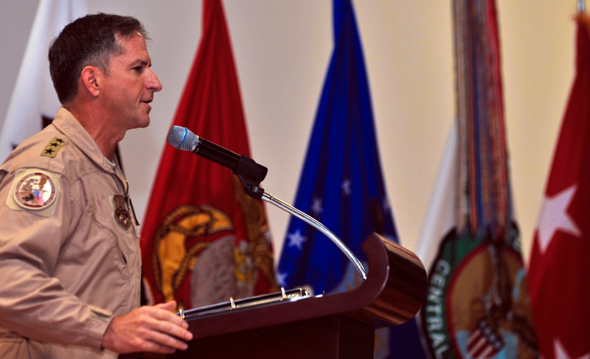 Lt. Gen. David L. Goldfein, commander of U.S. Air Forces Central Command, speaks during the USAFCENT change of command ceremony in which he assumed command, Aug. 3, 2011, in Southwest Asia. (U.S. Air Force photo/Senior Airman Paul Labbe)