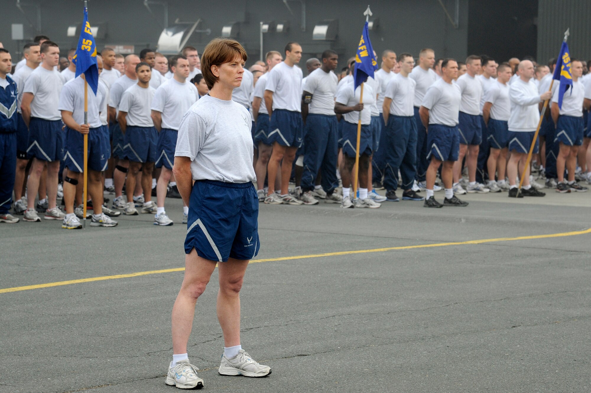 MISAWA AIR BASE, Japan -- Col. Cheryl Minto, 35th Maintenance Group, stands ready to take command of the Airmen at the start of the readiness run Aug. 5th. More than 400 Airmen, Sailors and Soldiers were joined by members of the Japan Air Self-Defense Force for this month's run. (U.S. Air Force photo/Staff Sgt. Marie Brown)