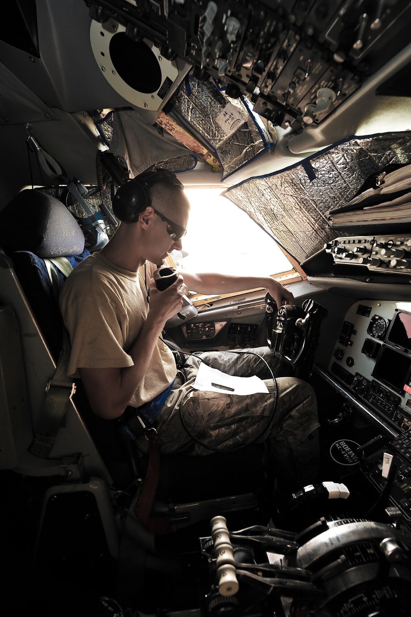 Airman 1st Class Justin Sobie, 340th Expeditionary Aircraft Maintenance Unit, monitors the refuel panel in the cockpit of a KC-135 Stratotanker, July 31, at an undisclosed location in Southwest Asia.  Sobie is deployed from McConnell Air Force Base, Kan.  (U.S. Air Force photo/Senior Airman Paul Labbe)