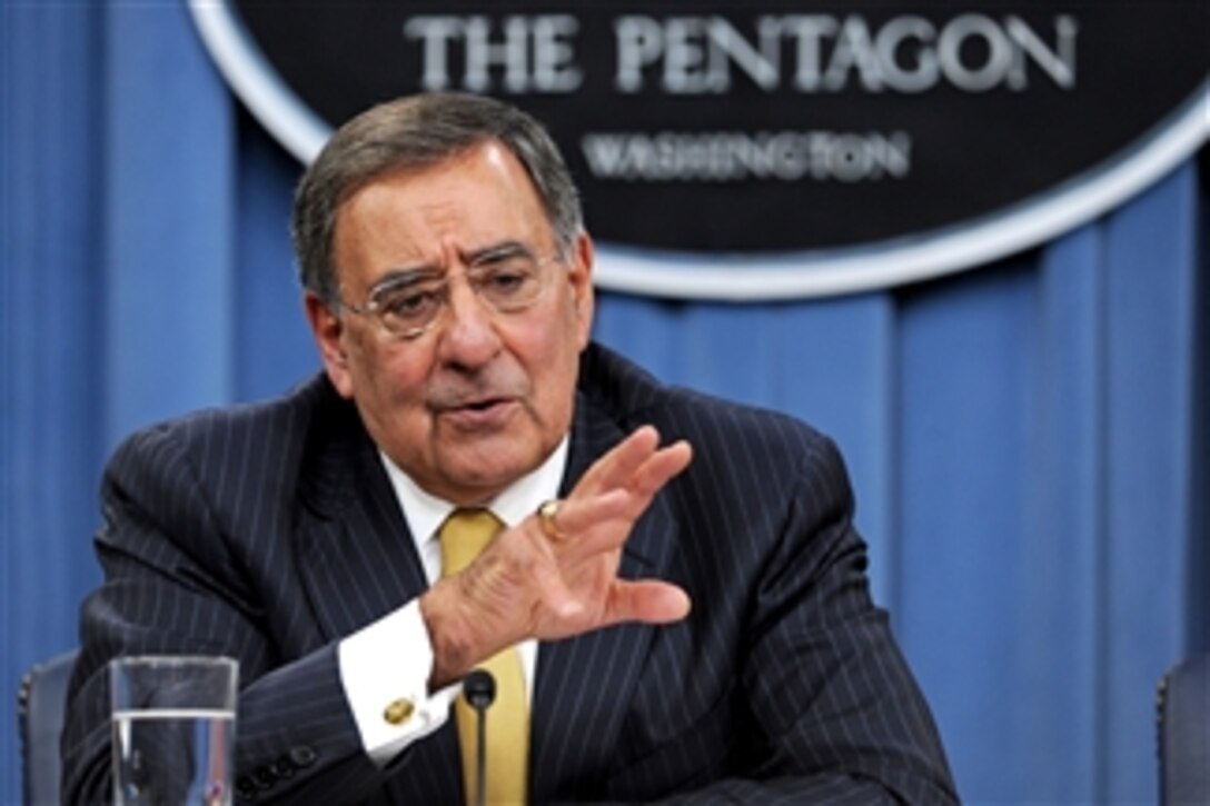 Secretary of Defense Leon E. Panetta responds to a reporter's question during his first Pentagon press briefing on Aug. 4, 2011.  Panetta was joined by Chairman of the Joint Chiefs of Staff Adm. Mike Mullen.  