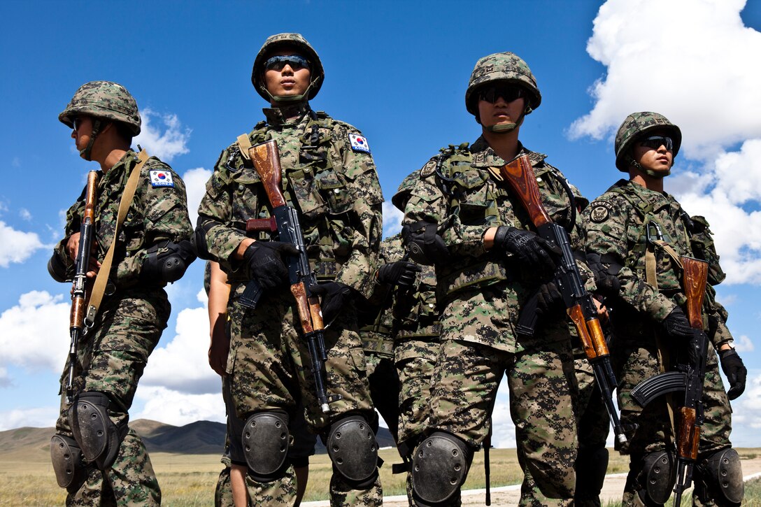 Korean special operations soldiers from the Republic of Korea army post as security during a search and cordon drill during Exercise Khaan Quest 2011 near Ulaanbaatar, Mongolia, Aug. 6. Khaan Quest is a training exercise designed to strengthen the capabilities of U.S., Mongolian and other nations’ forces in international peace support operations worldwide.
