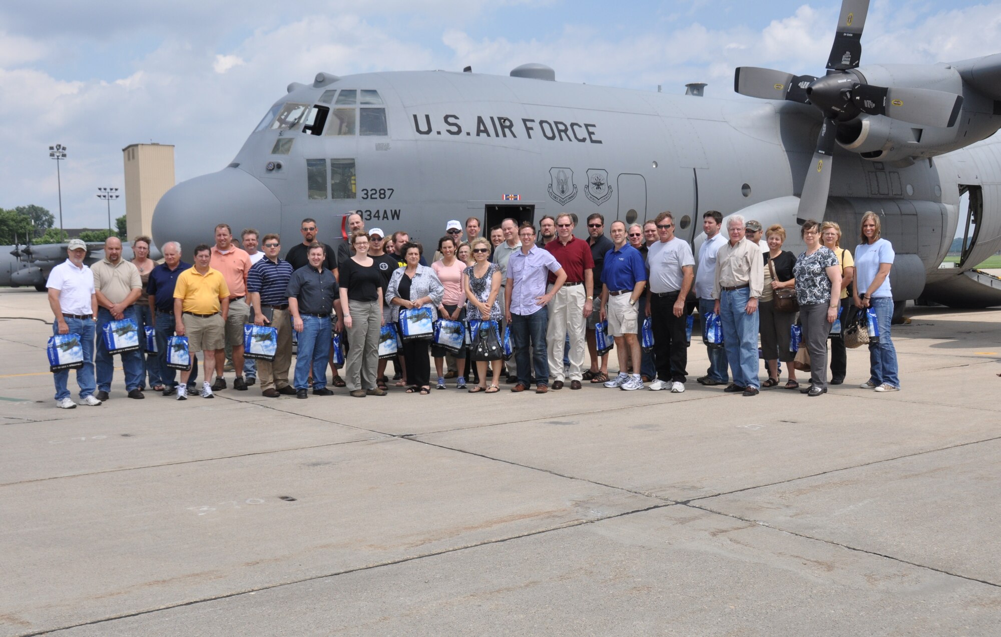 Employer's Day 2011 participants are all smiles following their orientation flight over Lake Superior near Duluth, Minn.  (Air Force photo/Staff Sgt. Kimberly Hickey)