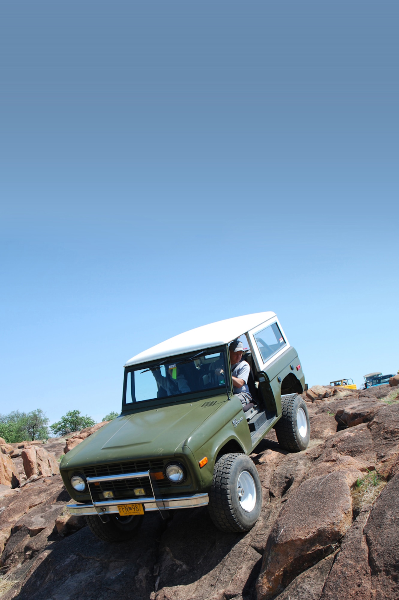 TEMPTED BY THE OTHER WOMAN -  Enjoying a rock crawler’s paradise, Meyer and Noah traverse the landscape of Katemcy 2 in Mason, Texas, May 1 at the Lonestar Early Bronco Club 12th Annual Spring Roundup. (Courtesy Photo by Chief Master Sgt. Charles Meyer)