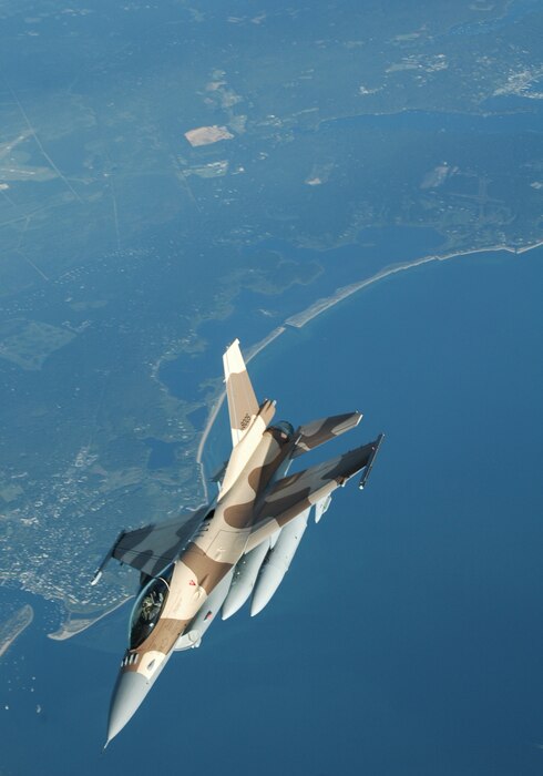 An F-16C flies eastbound over the United States on its way to its new home in the Kingdom of Morocco July 30, 2011. Morocco recently purchased 24 F-16s from the United States at an estimated cost of $2.1 billion. Airmen from the Utah, Arizona and South Carolina Air National Guard helped deliver the first ferry of four fighter aircraft to their new overseas location. U.S. Air Force photo by Maj. Krista DeAngelis (RELEASED)