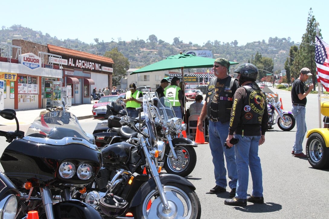 Veterans stand next to their motorcycles and chat outside of El Cajon Harley Davidson Aug. 6, during a fundraiser for Gunnery Sgt. David Smith who was injured in a motorcycle accident.