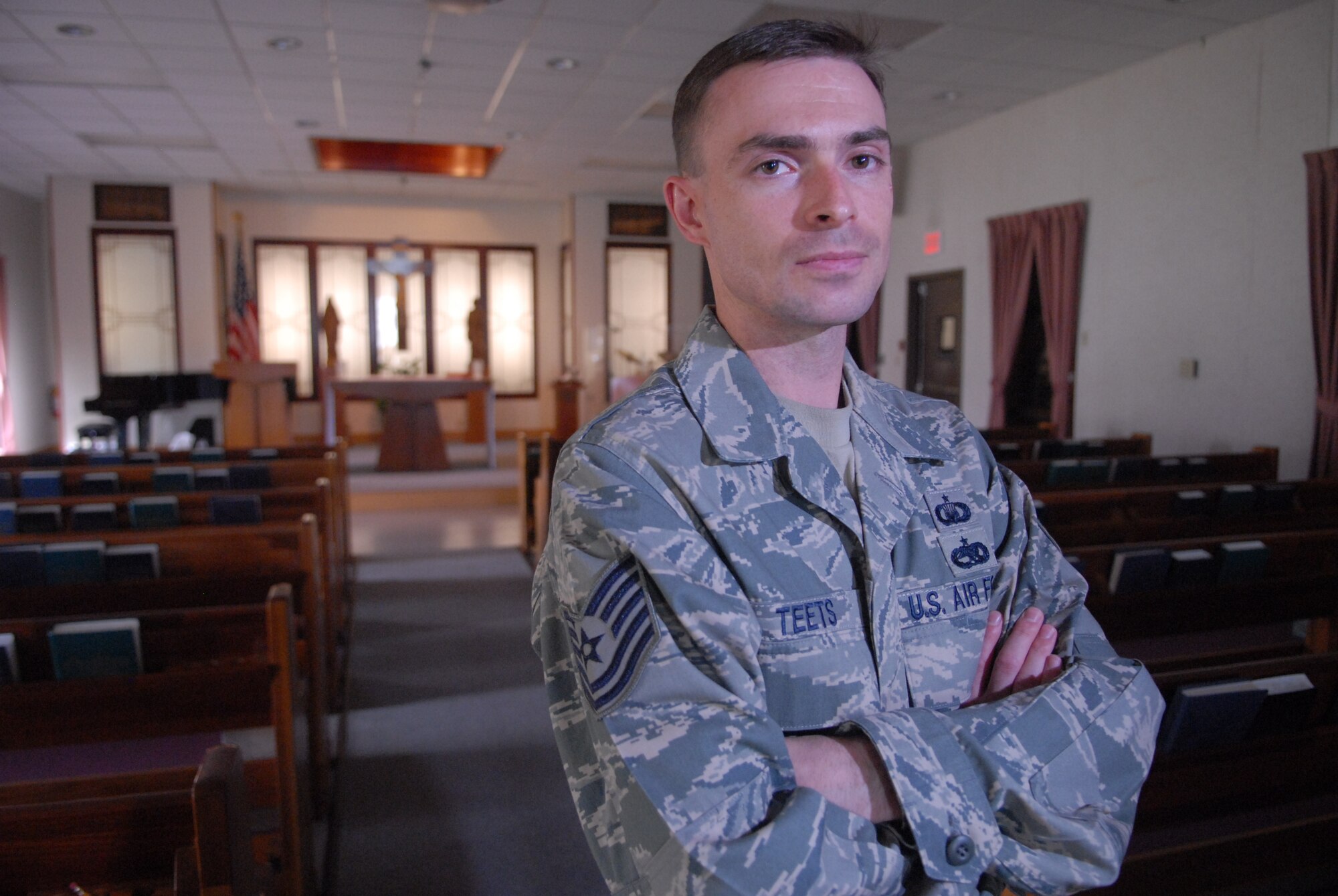 KUNSAN AIR BASE, Republic of Korea -- Tech. Sgt. Matthew Teets, the NCO in charge of Kunsan’s chapel, is responsible for all enlisted matters and ensuring his two fellow chaplain assistants meet the needs of the three assigned chaplains -- two Protestant, one Catholic.  Teets, a former F-16 avionics technician, cross trained into the 5R0X1 career field in 2006 because he liked the idea of helping people on a spiritual basis. (U.S. Air Force photo/Master Sgt. Sonny Cohrs)