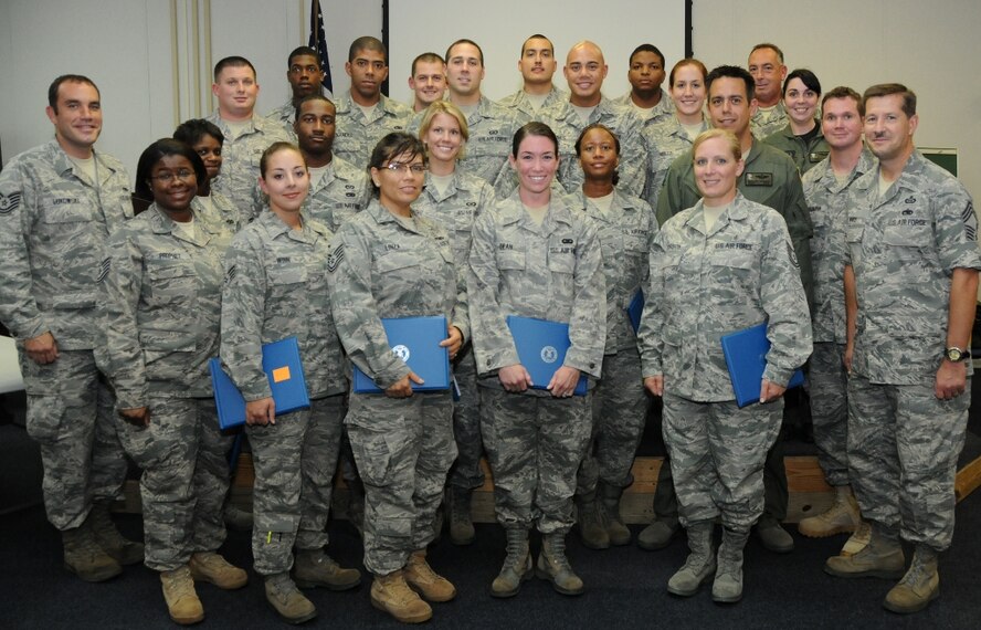 919th Special Operations Wing reservist graduates of the Noncommissioned Officers Leadership Development Course pose for a class photo Aug. 5 at Duke Field, Fla.   The 10-day curriculum teaches mid-level enlisted Airmen leadership, management and communication skills.  (U.S. Air Force photo/Tech. Sgt. Cheryl Foster)