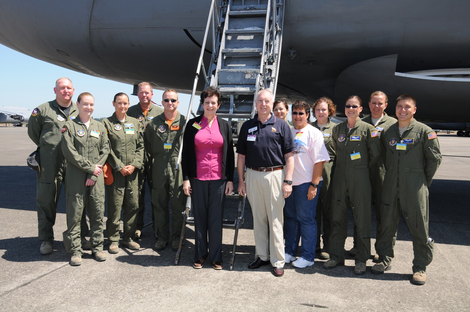 Reservists with the 446th Aeromedical Evacuation Squadron meet with two Vietnam War veterans at a C-5 Galaxy static display July 28 during Rodeo at Joint Base Lewis McChord-McChord Field.  Retired Colonel's Bud Traynor and Regina Aune survived a plane crash in 1975 at the end of the war as they were evacuating children from the country.  (U.S. Air Force photo by 2nd Lt. Denise Hauser)