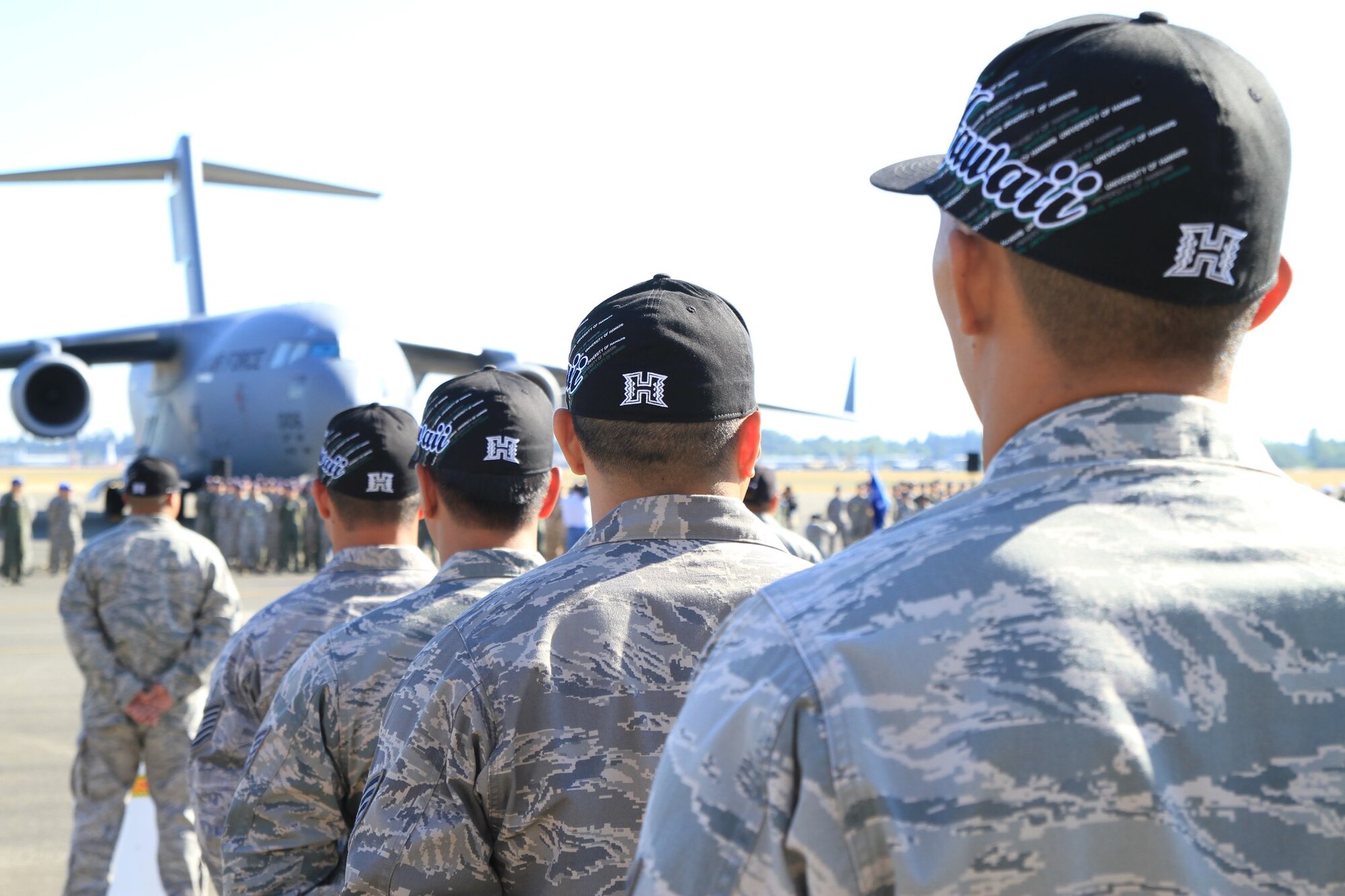 48th Aerial Port Members from Joint Base Pearl Harbor-Hickam, Hawaii, display their team colors in formation during the Air Mobility Rodeo 2011 held July 24-29 at Joint Base Lewis-McChord, Wash. The 48th APS is part of the 624th Regional Support Group headquartered at Joint Base Pearl Harbor-Hickam, Hawaii. (U.S. Air Force photo/Master Sgt. Peter Rieta)
