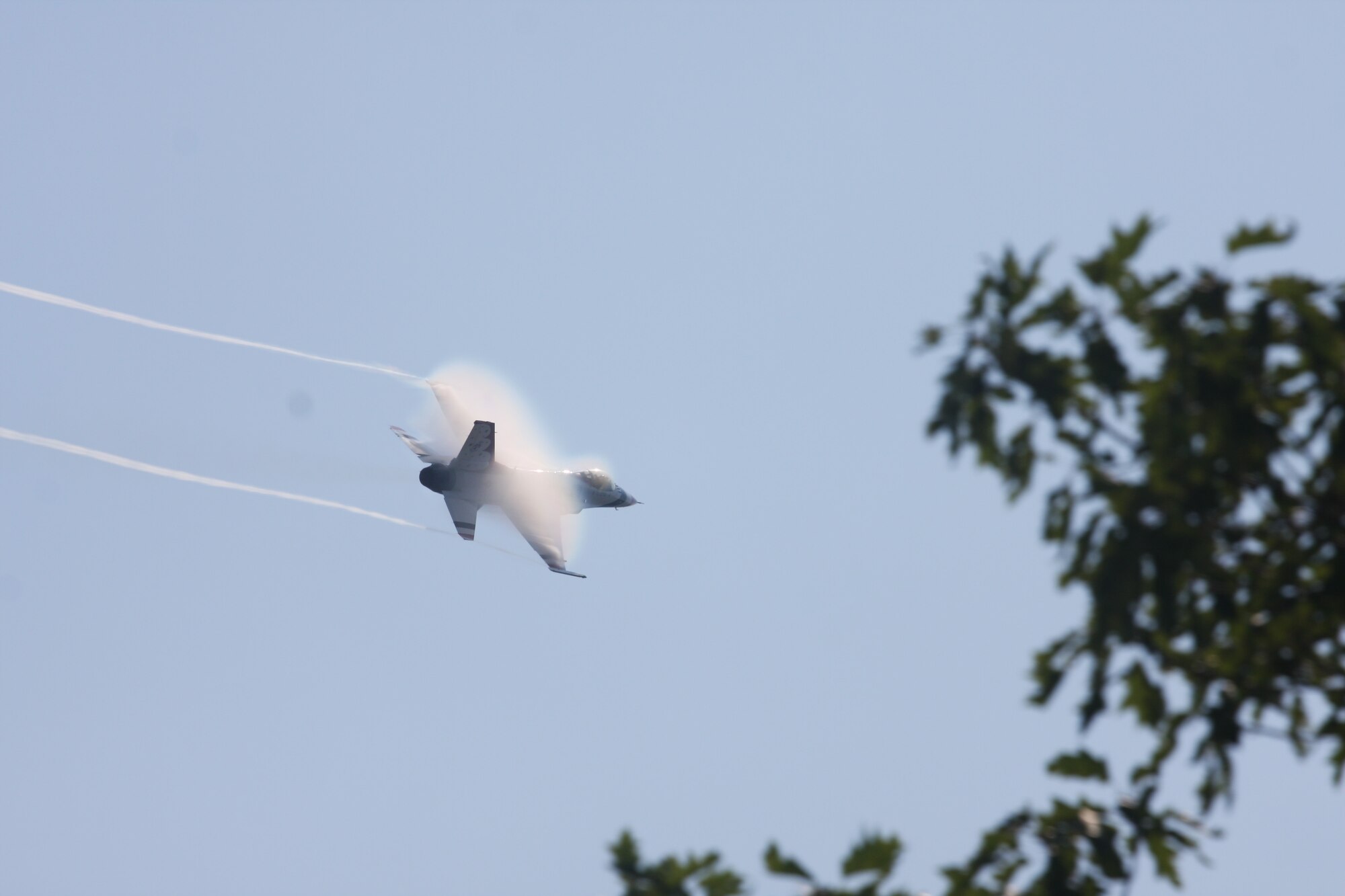 A Thunderbird executes a high-speed turn following an aerial maneuver over Bradford Beach during the 2011 Milwaukee Air and Water Show on Saturday, August 6.  The Thunderbirds' F-16C Falcons were hosted by the 128th Air Refueling Wing at Gen. Mitchell International Airport, Milwaukee.  (U.S. Air Force photo by Master Sgt. Kenneth Pagel / Released)