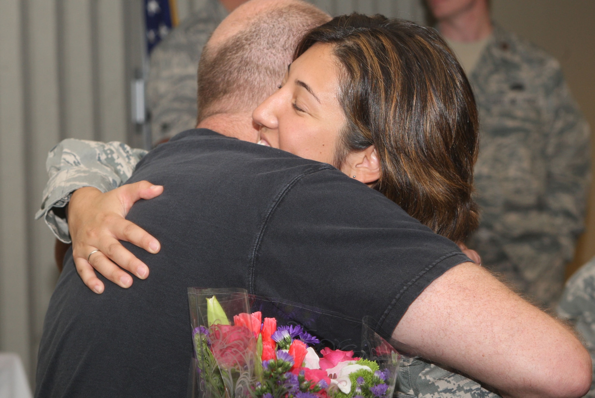 Commanders, supervisors, friends and families gathered together to congratulate the recent graduates of the Noncommissioned Officer Leadership Development Course at a ceremony held here Aug. 5. (U.S. Air Force Photo/Don Peek)