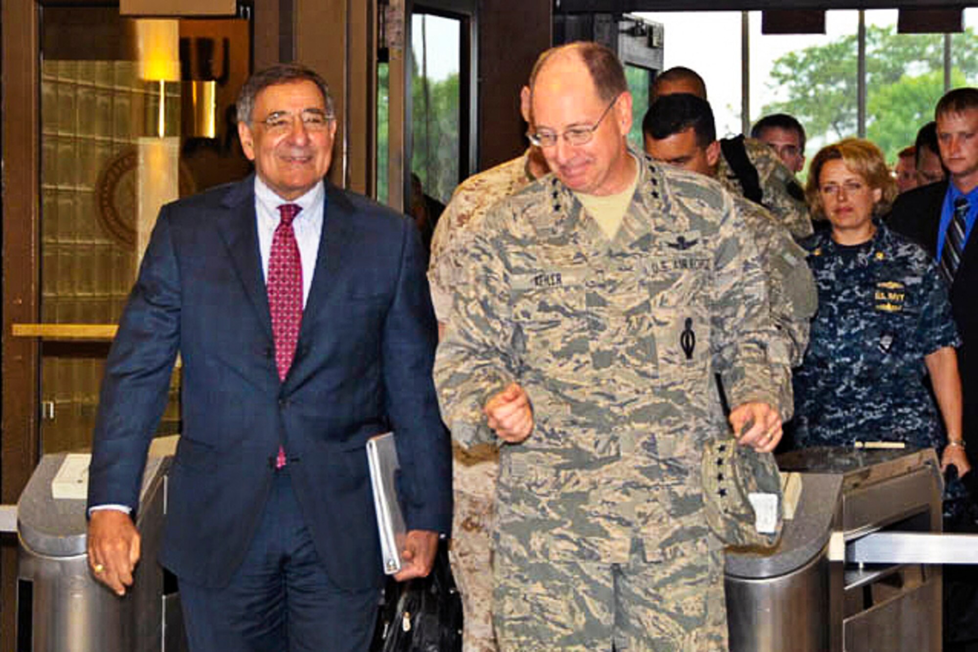 Defense Secretary Leon E. Panetta walks with Air Force Gen. C. Robert Kehler, commander of U.S. Strategic Command, during an Aug. 5, 2011, visit to STRATCOM headquarters at Offutt Air Force Base, Neb.   (Defense Department photo)