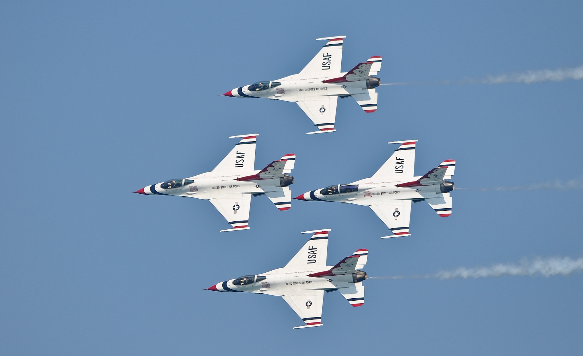 The Thunderbirds fly in a diamond formation over Bradford Beach during the 2011 Milwaukee Air and Water Show on Saturday, August 6.  The air show took place Saturday and Sunday, and the Thunderbirds flew both days.  (U.S. Air Force photo by Staff Sgt. Jeremy Wilson / Released)