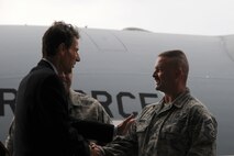 STEWART AIR NATIONAL GUARD BASE, NEWBURGH NY; Mr. Bob P. Ciesla, program manager for the C-17 Globemaster III program for Boeing, presents a coin to SMSgt Jeffrey Sheehy, one of the first dedicated C-17 Crew Chiefs at the 105th Aircraft Maintenance Squadron. (USAF Photo TSgt Lee Guagenti) (RELEASED)