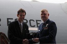 STEWART AIR NATIONAL GUARD BASE, NEWBURGH NY; Mr. Bob P. Ciesla, program manager for the C-17 Globemaster III program for Boeing, presents a model of the C-17 Globemaster III to Brigadier Gen. Verle L. Johnston Jr, commander of the 105th Airlift Wing. (USAF Photo TSgt Lee Guagenti) (RELEASED)