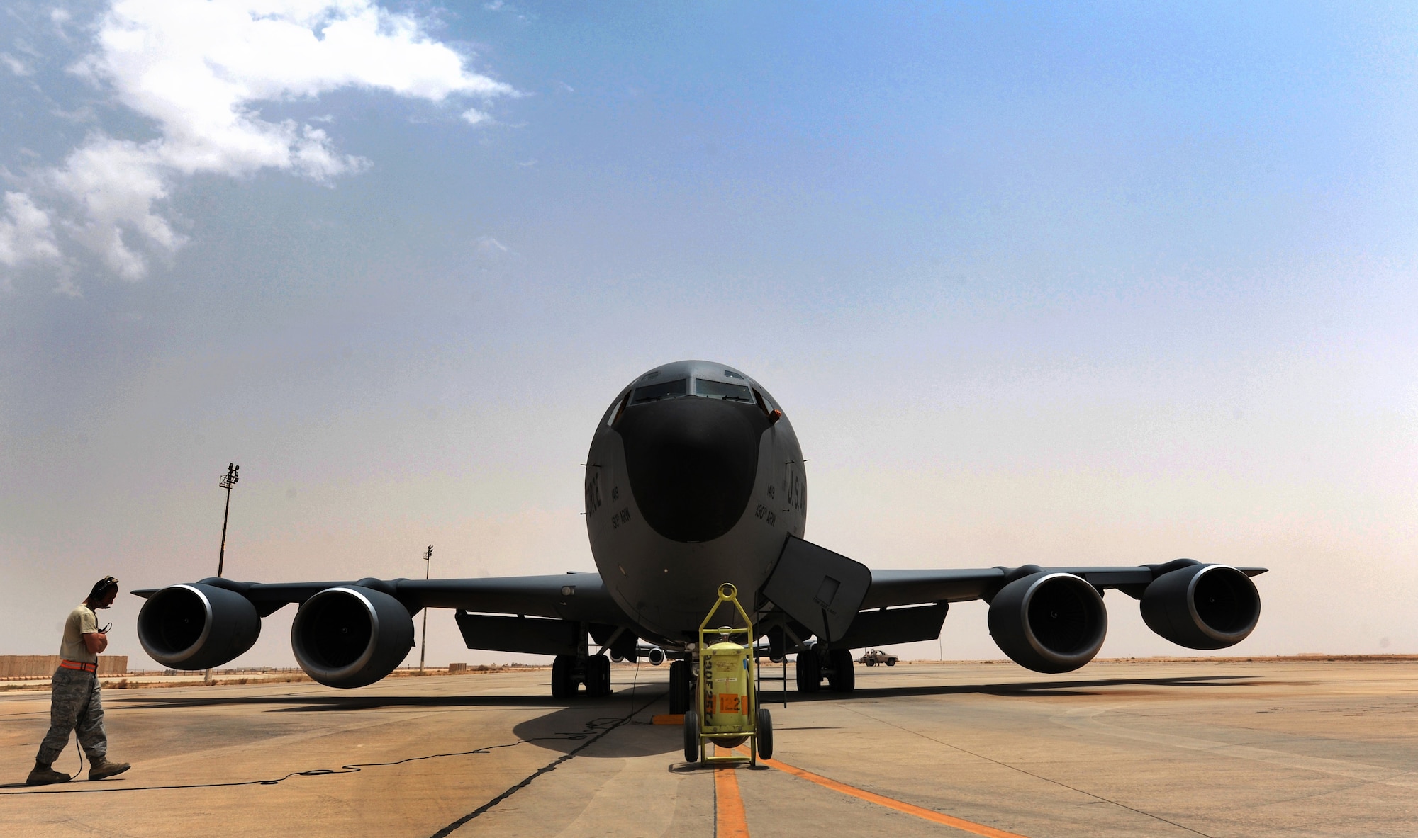 Air Force Staff Sgt. Alan Peterson, instrument flight control specialist, makes a final inspection of a KC-135 Stratotanker before taking off in Southwest Asia. The pilots and airmen work together to ensure the safety of the aircraft before take off. (U.S. Air Force photo by Senior Airman Tristin English)
