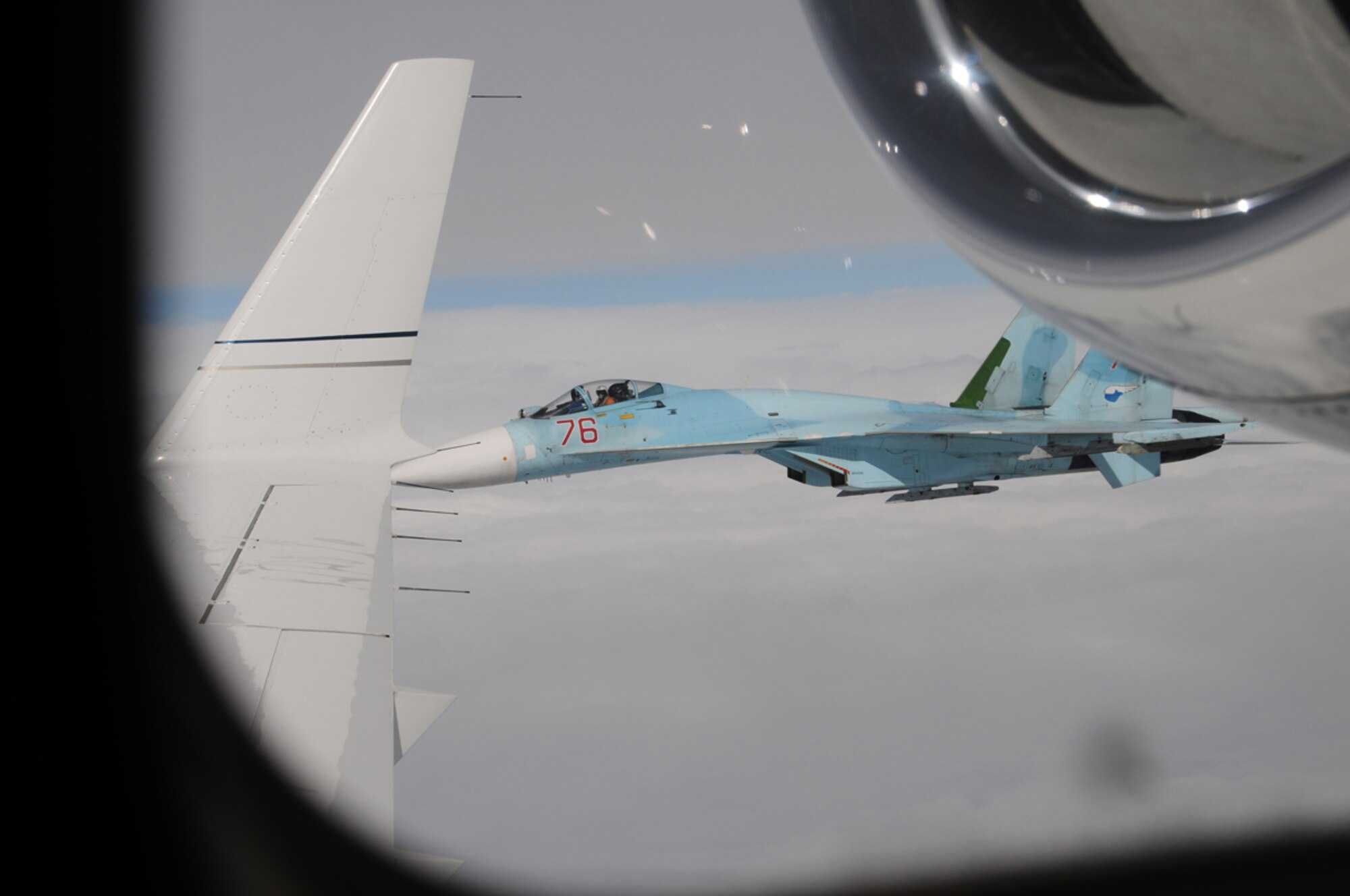 A Russian SU-27 Flanker, flying from Petropavlovsk-Kamchatski, intercepts Fencing 1220, a suspected hijacked aircraft during Exercise Vigilant Eagle Aug. 7.  Fighters and Airborne Warning and Control aircraft from the United States and Russia participated in Vigilant Eagle 2011.  The exercise marks the second year of cooperation between the Russian Federation and NORAD to counter possible threats of air terrorism crossing international boundaries.  (U.S. Air Force photo by Capt. Uriah Orland)