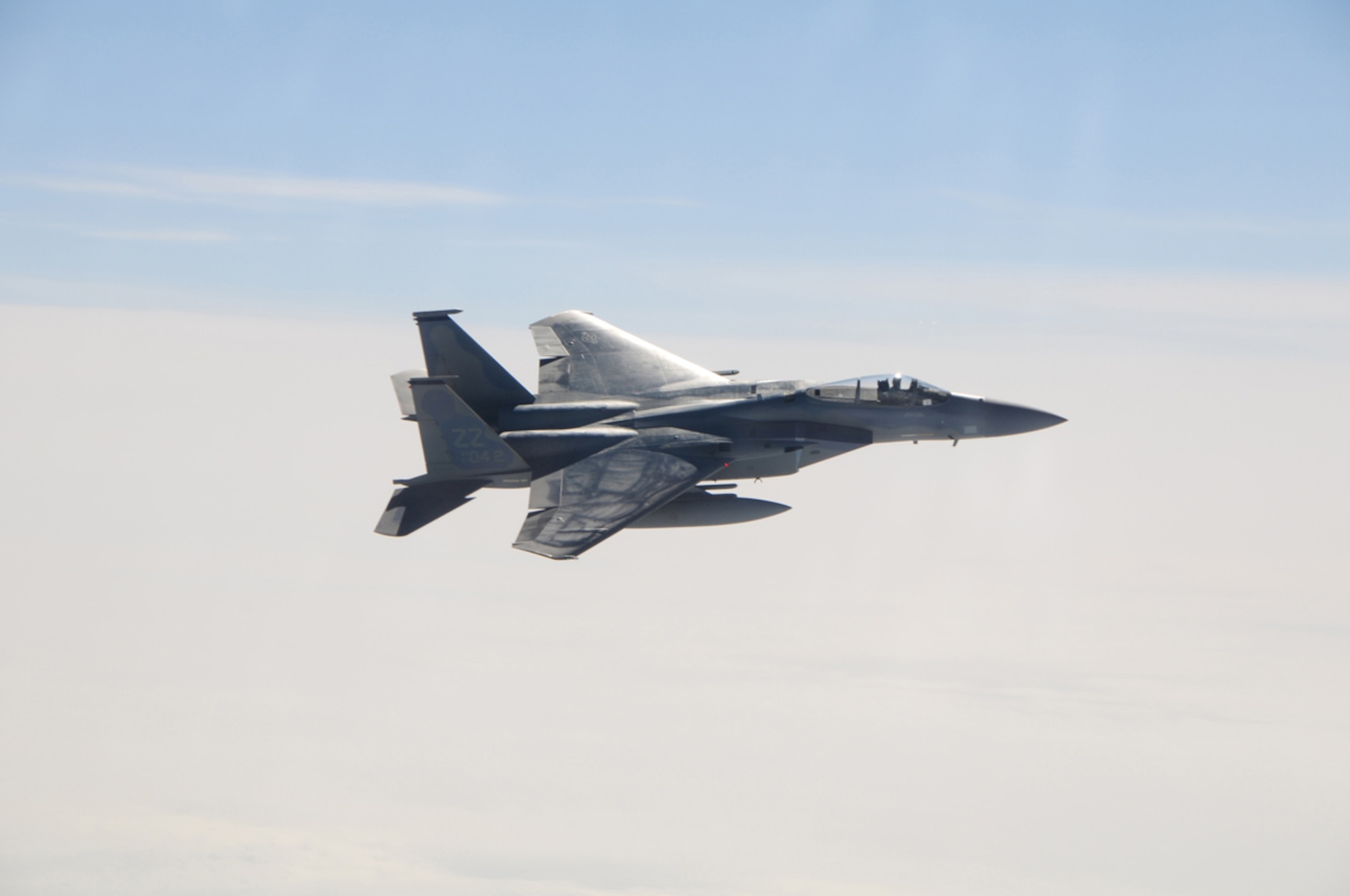 An F-15C Eagle assigned to the 18th Wing at Kadena Air Base, Japan, and temporarily based at Joint Base Elmendorf-Richardson, Alaska, intercepts Fencing 1220, a suspected hijacked aircraft during Exercise Vigilant Eagle Aug. 7.  Vigilant Eagle 2011 marks the second year of cooperation between the Russian Federation and NORAD to counter possible threats of air terrorism crossing international boundaries.  (U.S. Air Force photo by Capt. Uriah Orland)