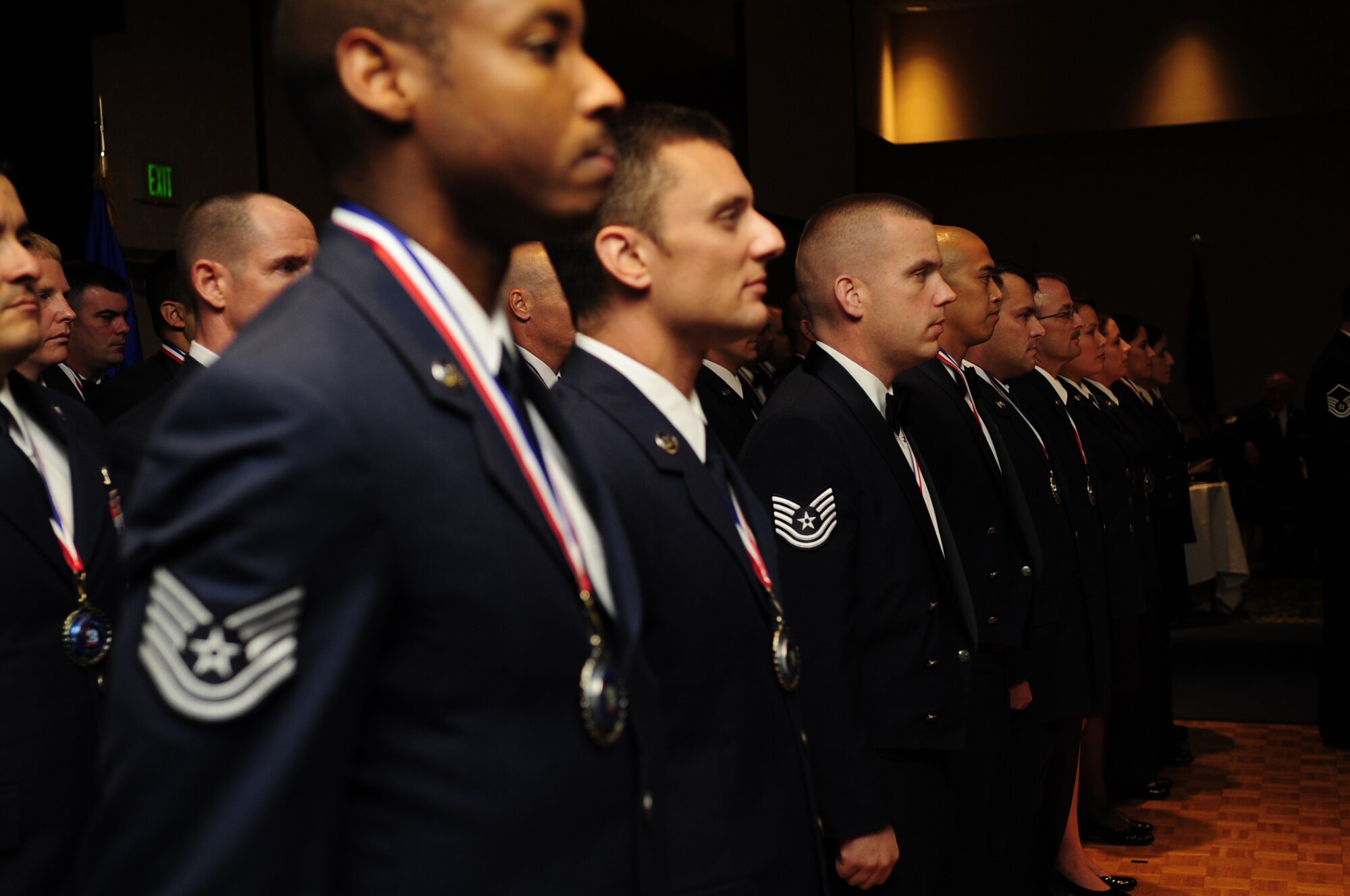 VANDENBERG AIR FORCE BASE, Calif. – Inductees stand at attention to formally be inducted as senior non-commissioned officers during the SNCO Induction Ceremony at the Pacific Coast Club here Friday, Aug. 5, 2011. The ceremony formally recognizes Airmen in the transition from the non commissioned officer to the senior NCO tier. (U.S. Air Force photo/Senior Airman Lael Huss)