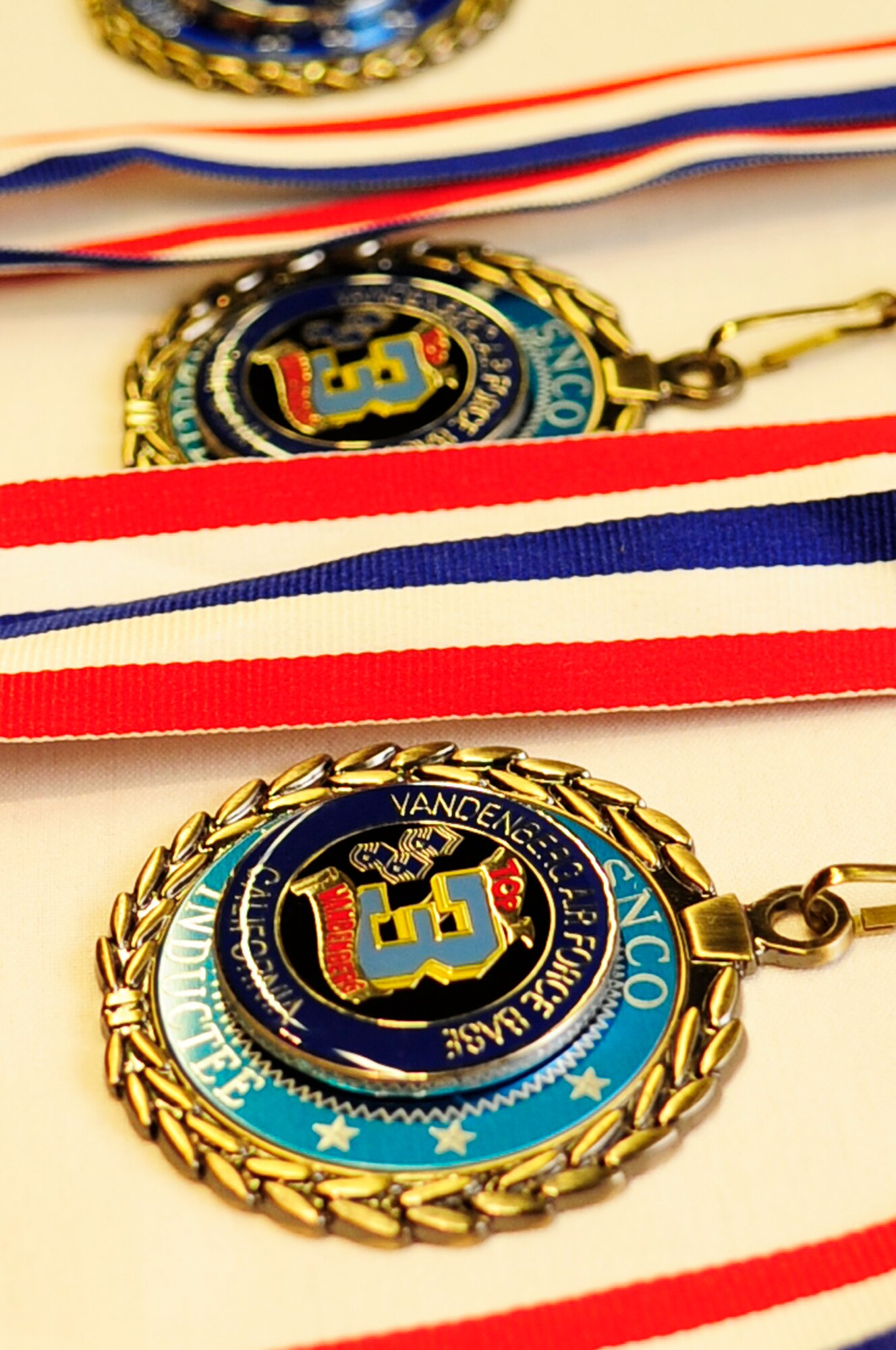 VANDENBERG AIR FORCE BASE, Calif. – Medals lay on display before the medallion ceremony during the Senior Non-Commissioned Officer Induction Ceremony at the Pacific Coast Club here Friday, Aug. 5, 2011. The ceremony formally recognizes Airmen in the transition from the Non Commissioned Officer to the Senior NCO tier. (U.S. Air Force photo/Senior Airman Lael Huss)
