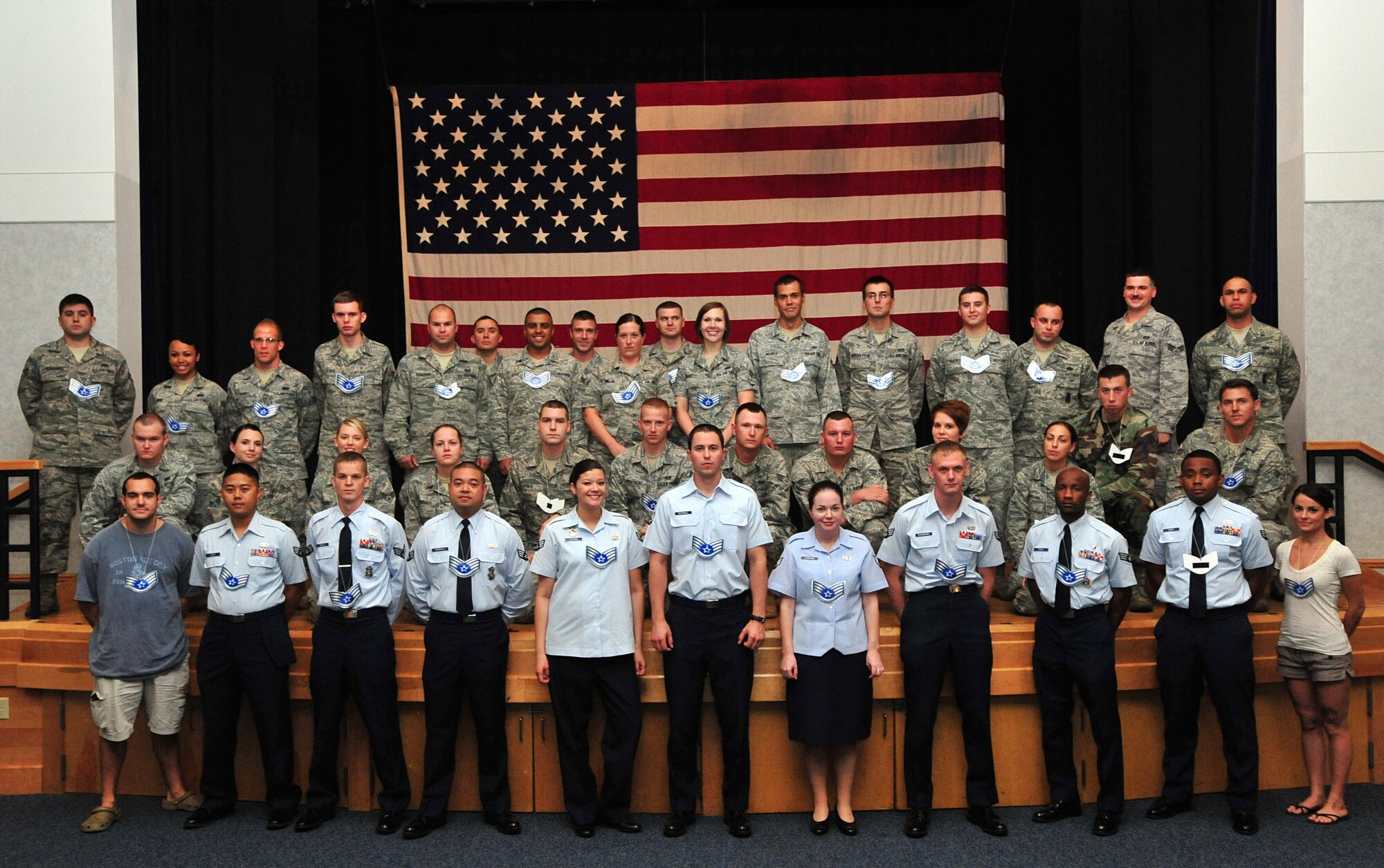 Staff sergeants selects pose for a photo at the Robert J. Dole Community Center Aug. 8, 2011, McConnell Air Force Base, Kan.  Over 40 senior airmen were chosen from McConnell. (U.S. Air Force photo/ Senior Airman Courtney Witt)
