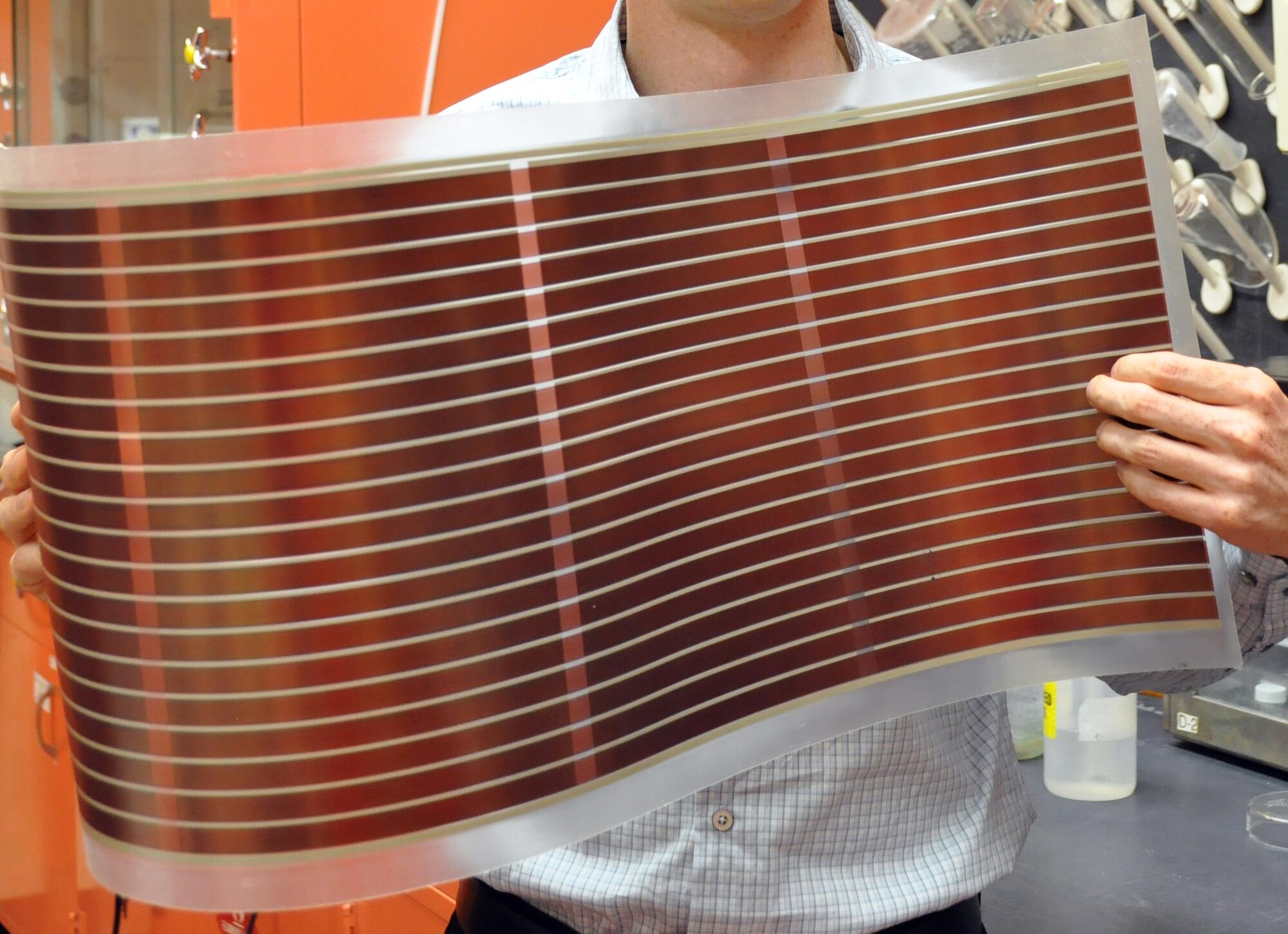 AFRL researchers have found an important source of performance variability in flexible solar cells such as this one, an essential component in evaluating new materials and architectures, and improving the efficiency of organic solar cells.  (AFRL Image)