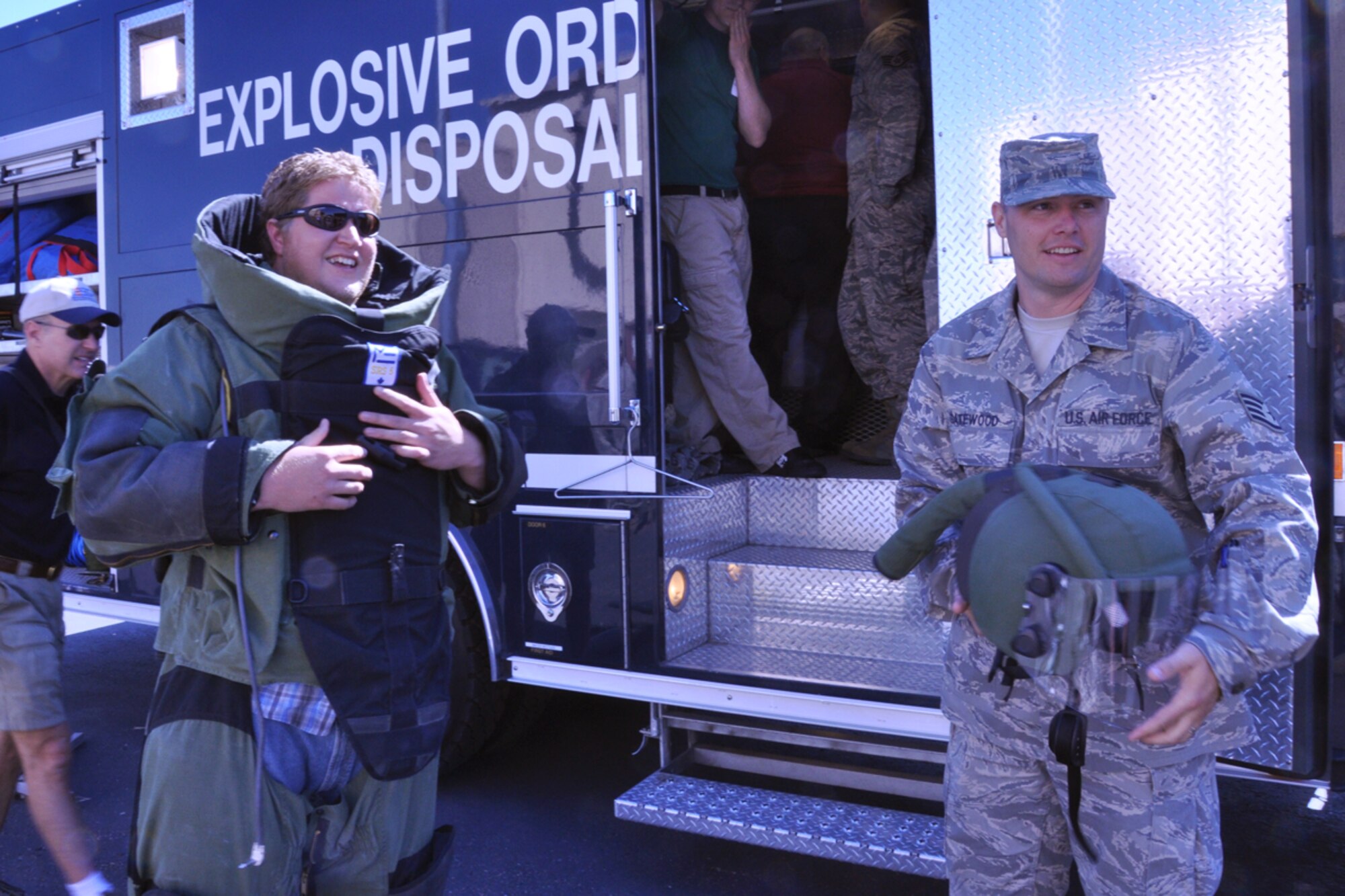 Nathan Anderson, a civilian employer from Nucor Building Systems in Brigham City, tries on a bomb suit during an Explosive Ordnance Disposal demonstration here Sunday as part of Employer Appreciation Day. The suit helps protect EOD technicians when they must detonate a bomb. (U.S. Air Force photo/Staff Sgt. Heather Skinkle)