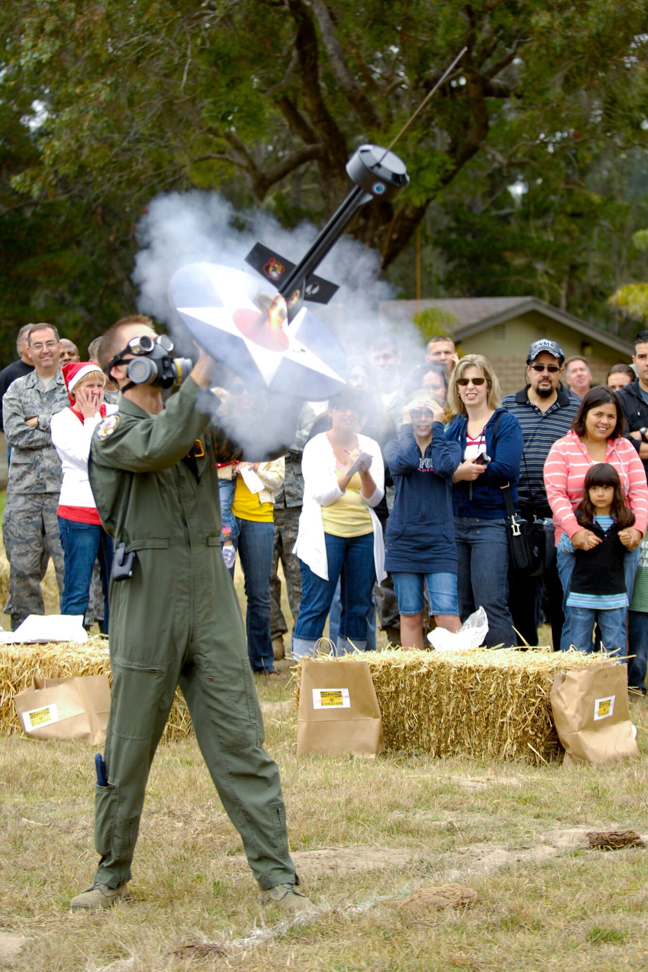Vandenberg Air Force Base, Calif. -- A Team V member launches a cow pie during the 23rd Annual Texas Blowout here Friday, Aug. 5, 2011.  The event held multiple events during the day. (U.S. Air Force/Staff Sgt. Levi Riendeau)