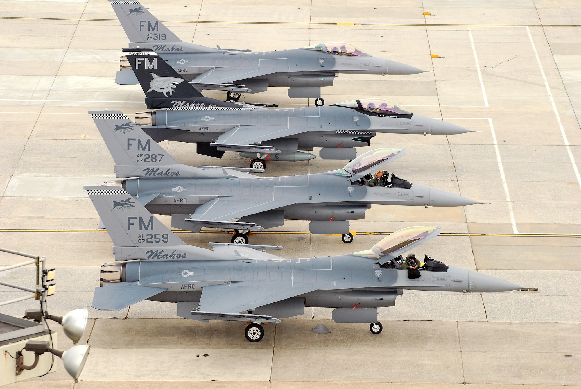 F-16C block 30 General Electric powered fighter aircraft from the 482nd Fighter Wing at Homestead Air Reserve Base, Fla., arrive on the ramp at Dobbins Air Reserve Base, Ga., 4 Aug. Pilots from the 93rd Fighter Squadron flew the jets here as a precautionary measure to avoid possible damage from tropical storm Emily, currently brewing in the Atlantic Ocean.  (U.S. Air Force photo/ Shaun Shenk)