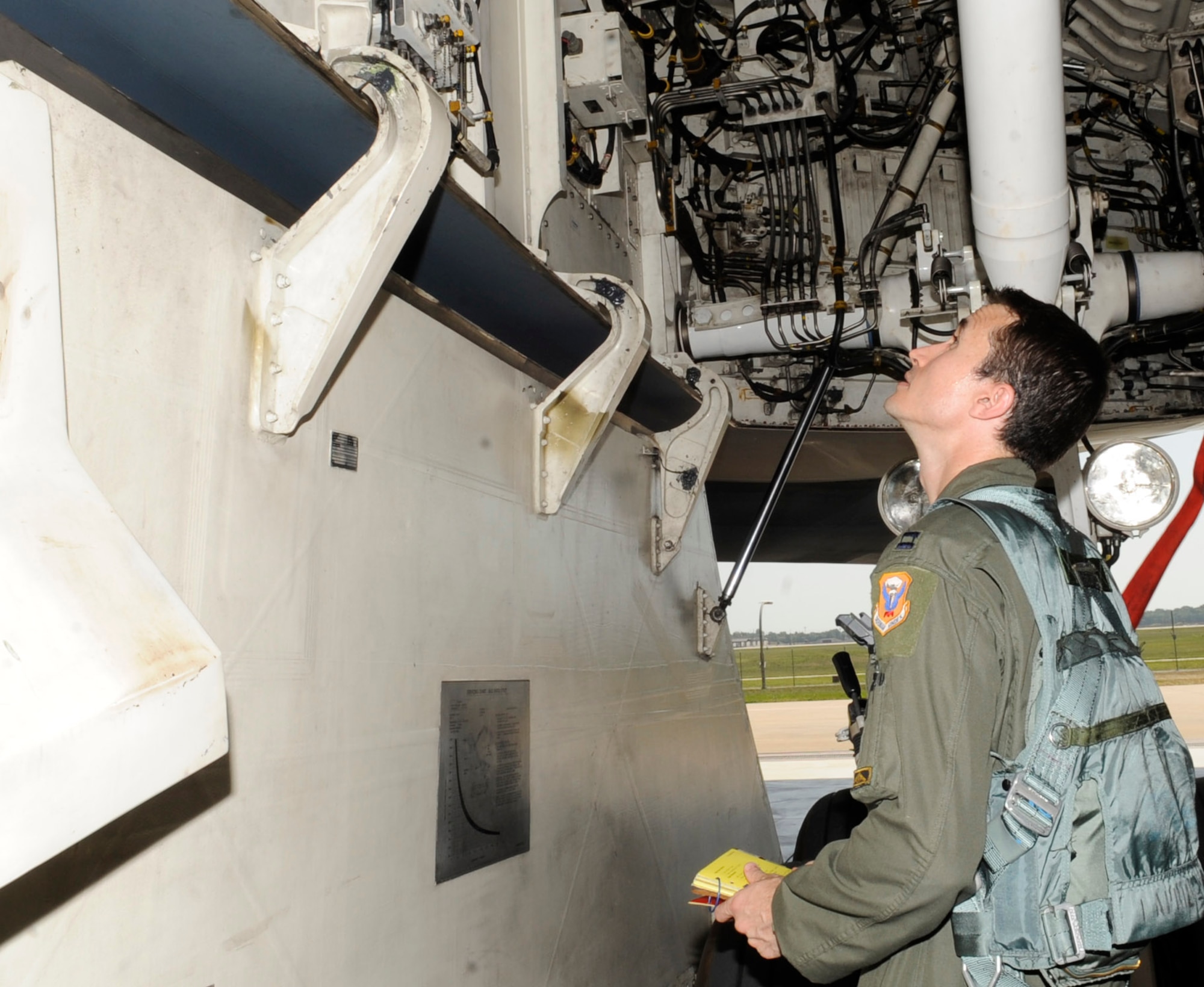WHITEMAN AIR FORCE BASE, Mo. – Capt. Rick Lyon, 393rd Bomb Squadron pilot, Capt. Rick Lyon, 393rd Bomb Squadron pilot, reviews his checklist before departing Whiteman July 25 for the bomber operations portion of Air Force Global Strike Command's second annual Global Strike Challenge. (U.S. Air Force photo by Senior Airman Alexandra M. Boutte) (RELEASED)