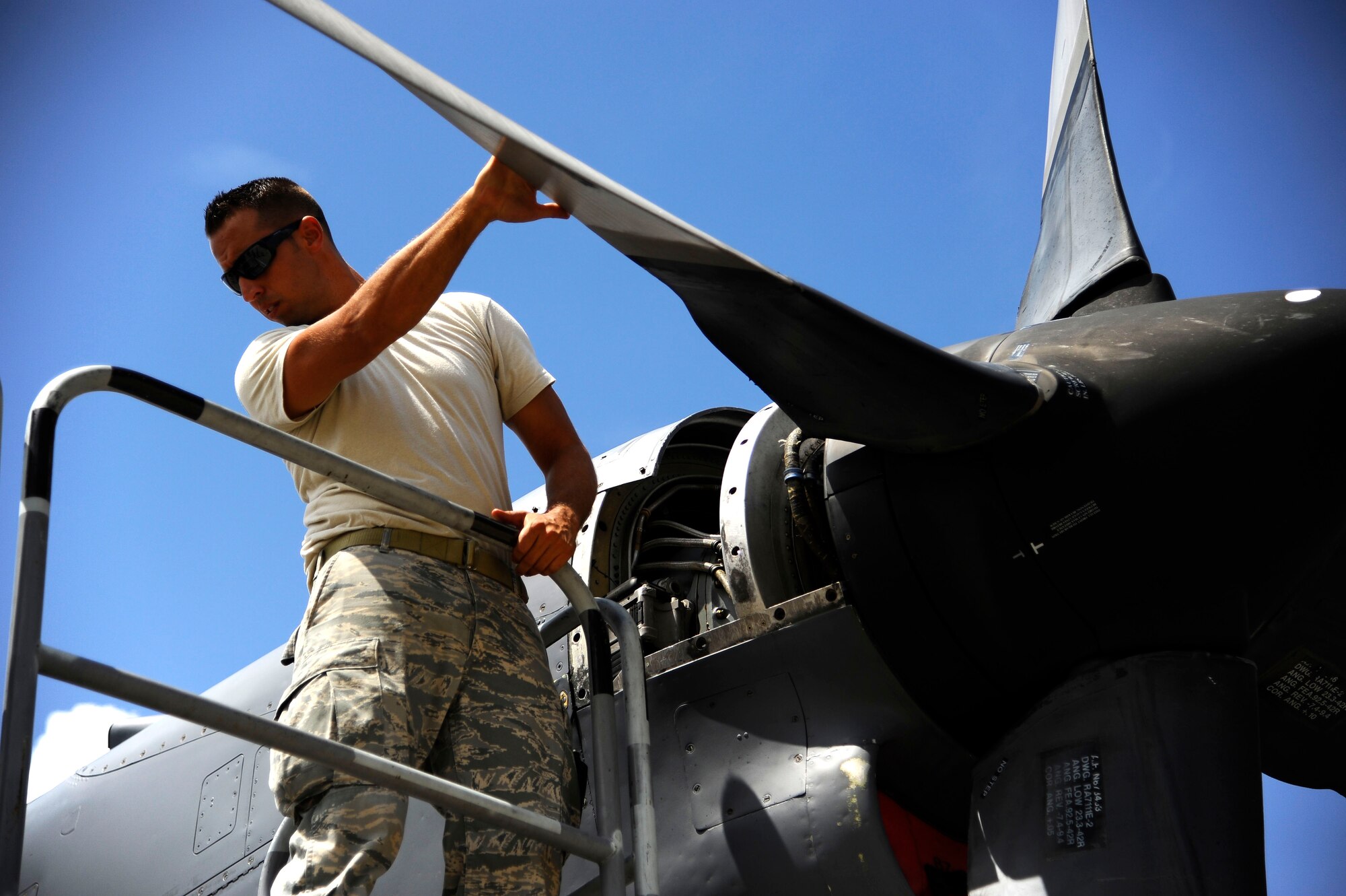 U.S. Air Force Staff Sgt. Todd Bishop, 1st Special Operations Maintenance Squadron aerospace propulsion journeyman, troubleshoots an MC-130H Combat Talon II engine on the flightline at Eglin Air Force Base, Fla., July 25, 2011.  The 1st SOMXS’s mission is to organize, train and equip Airmen to perform aircraft maintenance and back shop support for the MC-130P Combat Shadow flown by the 9th Special Operations Squadron as well as other special operation aircraft. (U.S. Air Force photo by Airman Gustavo Castillo)