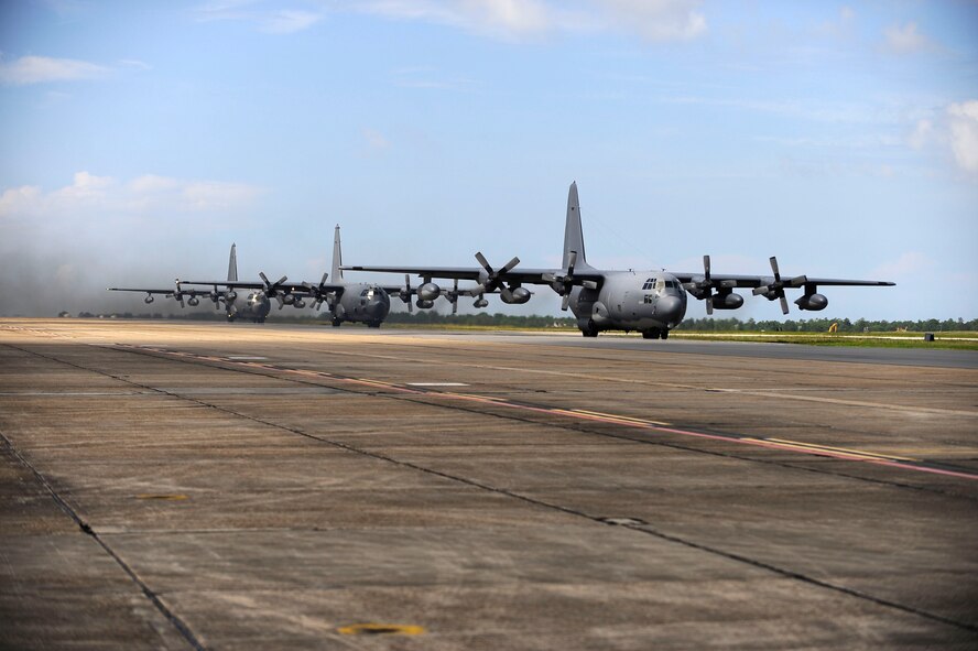 Three 9th Special Operations Squadron MC-130P Combat Shadows taxi on the flightline during a field exercise at Eglin Air Force Base, Fla., July 25, 2011.  The 9th SOS’s mission is the penetration of enemy territory using low-level formations to provide aerial refueling of special operations helicopters and the insertion, extraction and resupply of special operations forces by airdrops or air-land operations. (U.S. Air Force photo by Airman Gustavo Castillo) 