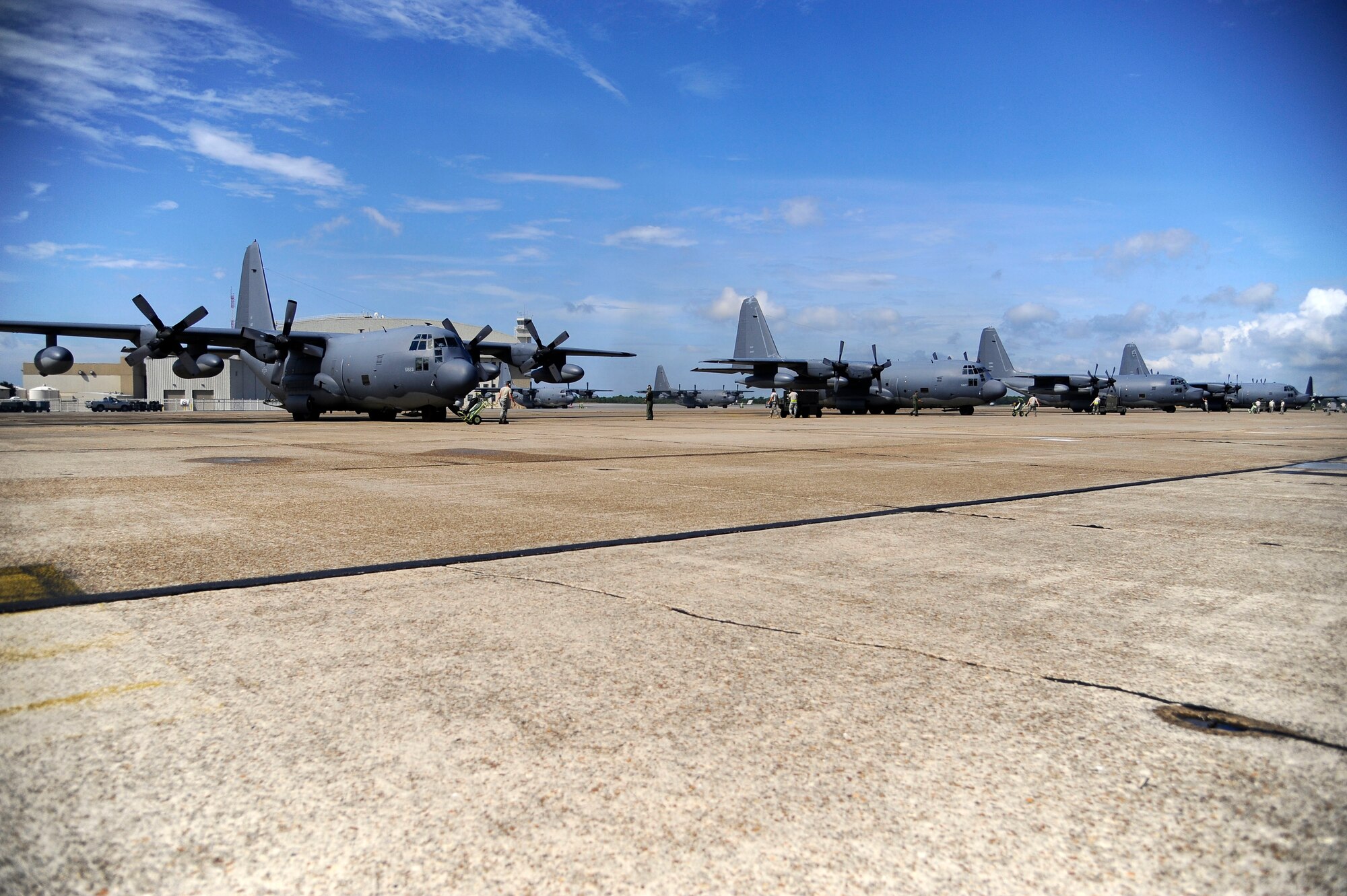 Airmen from the 1st Special Operations Maintenance Squadron conduct preflight checks on four MC-130P Combat Shadows and two MC-130H Combat Talon IIs during a training exercise on the flightline at Eglin Air Force Base, Fla., July 25, 2011.  Five of these aircraft departed simultaneously creating a rare dissimilar formation normally reserved for combat in deployed environments. (U.S. Air Force photo by Airman Gustavo Castillo)