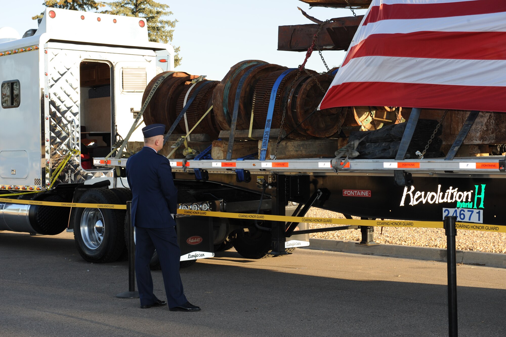 BUCKLEY AIR FORCE BASE, Colo. -- Colonel Daniel Dant, 460th Space Wing commander, looks on pieces of the World Trade Center in remembrance here Aug. 8, 2011. The pieces, believed to be from the fifth floor of the North Tower, are only a few that have been shipped from the Port Authority of New York and New Jersey to cities and communities across the country. (U.S. Air Force photo by Senior Airman Marcy Glass)