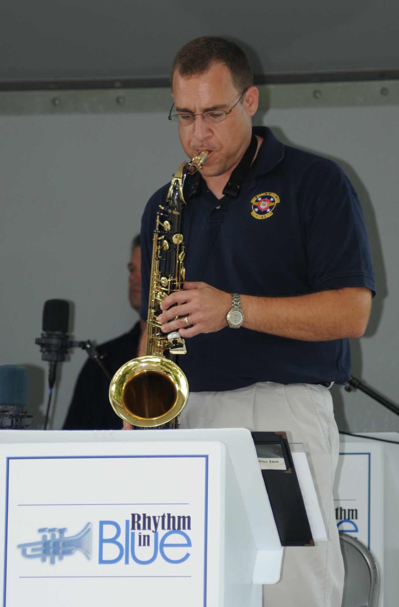 Tech. Sgt. Jeff Saunders with Rhythm in Blue of the U.S. Air Force Heritage of America Band plays at the 512th Airlift Wing biennial picnic Aug. 6 at Eagle's Nest here. More than 2,000 people attended the event. (U.S. Air Force photo by Capt. Marnee A.C. Losurdo) 