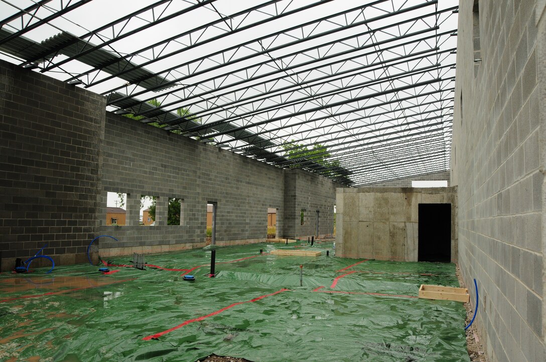 Indoor firing range construction progresses at Niagara Falls Air Reserve Station, N.Y. on August 3, 2011. This 6.3 million dollar 21,000 square foot facility will be utilized by several units stationed at the base in addition to other local, state and federal law enforcement agencies. (U.S. Air Force photo by Peter Borys)