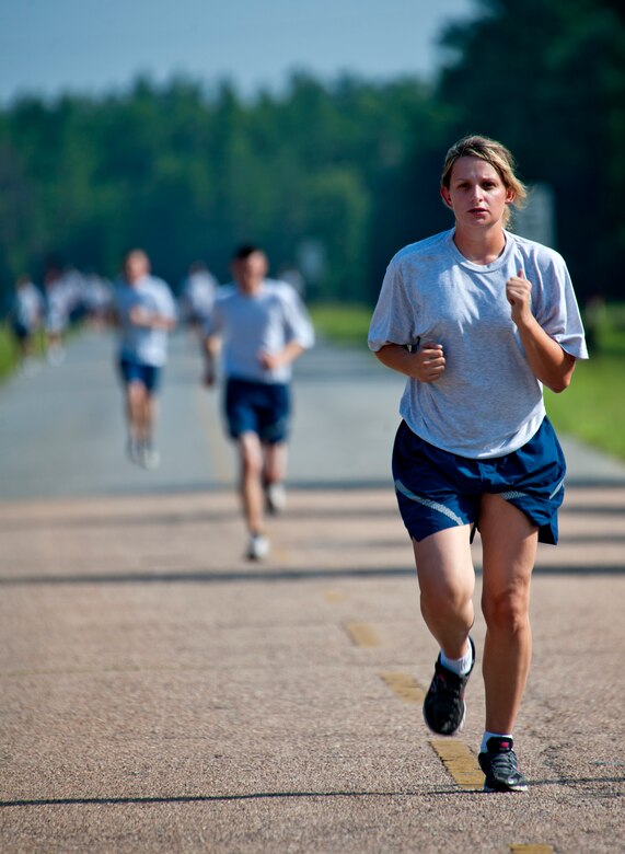 Duke Field reservists challenge the August heat and pavement as they move toward the finish line of the run portion of their semi-annual physical training assessment Aug. 7.  (U.S. Air Force photo/Tech Sgt. Samuel King Jr.)