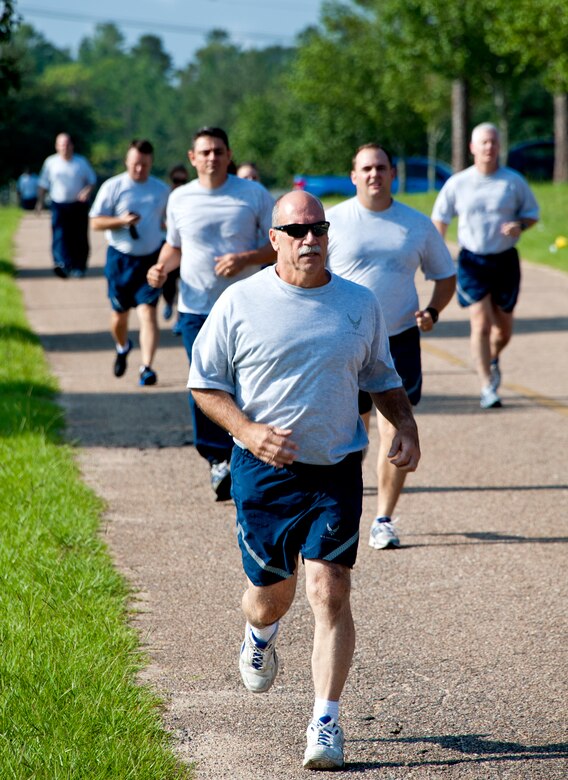 Duke Field reservists challenge the August heat and pavement as they begin the run portion of their semi-annual physical training assessment Aug. 7.  (U.S. Air Force photo/Tech Sgt. Samuel King Jr.)