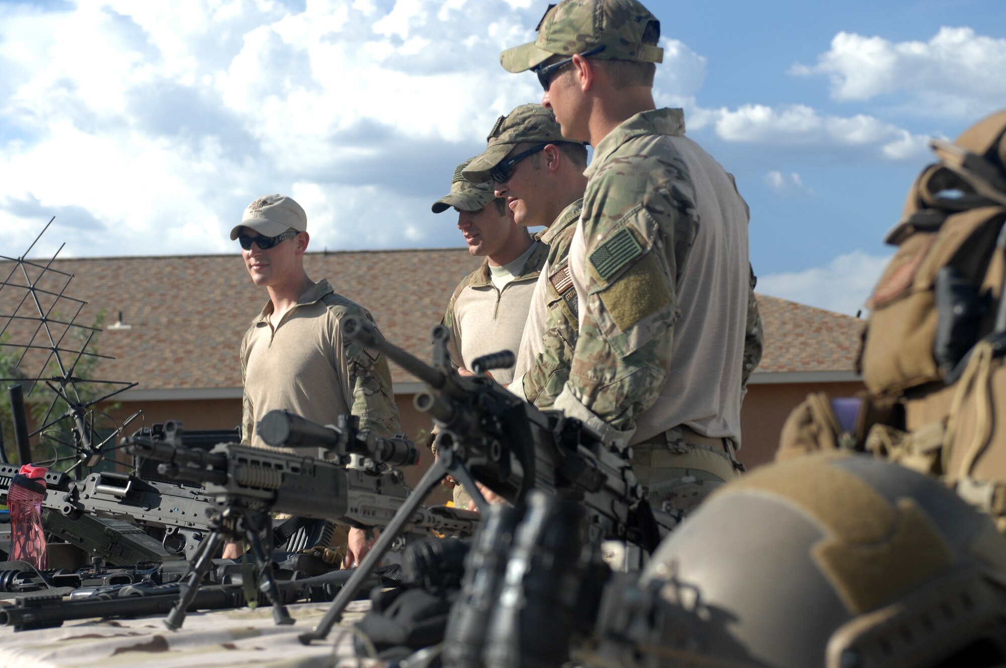 DAVIS-MONTHAN AIR FORCE BASE, Ariz. – Airmen from the 48th Rescue Squadron display the equipment they use for operations during the National Night Out event here Aug. 2. Volunteers from D-M and the Tucson, Ariz. area participated in the event to promote neighborhood and police-community partnership. (U.S. Air Force photo/Airman 1st Class Timothy D. Moore)