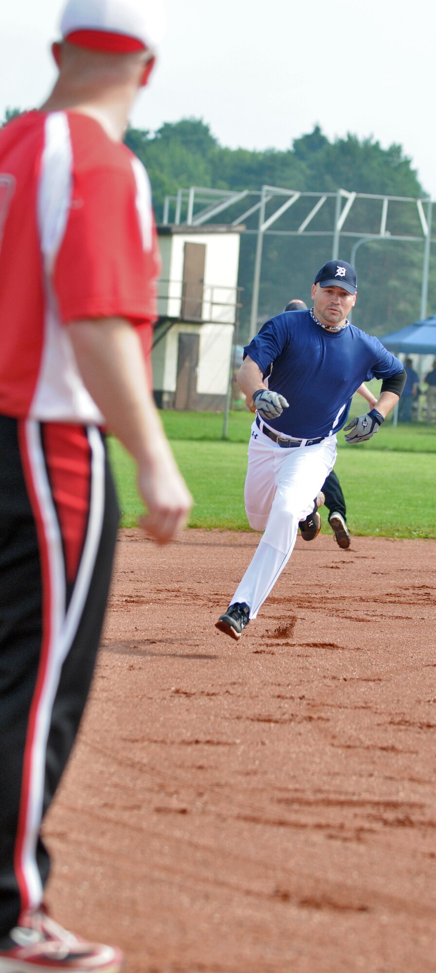 SPANGDAHLEM AIR BASE, Germany – Troy Soeder runs a home run during a U.S. Air Forces in Europe Small Units Softball Tournament game against the Royal Air Force Croughton Cougars here Aug. 4. The 726th Air Mobility Squadron won the tournament or out the seven teams from across Europe that competed. (U.S. Air Force photo/Senior Airman Nick Wilson)