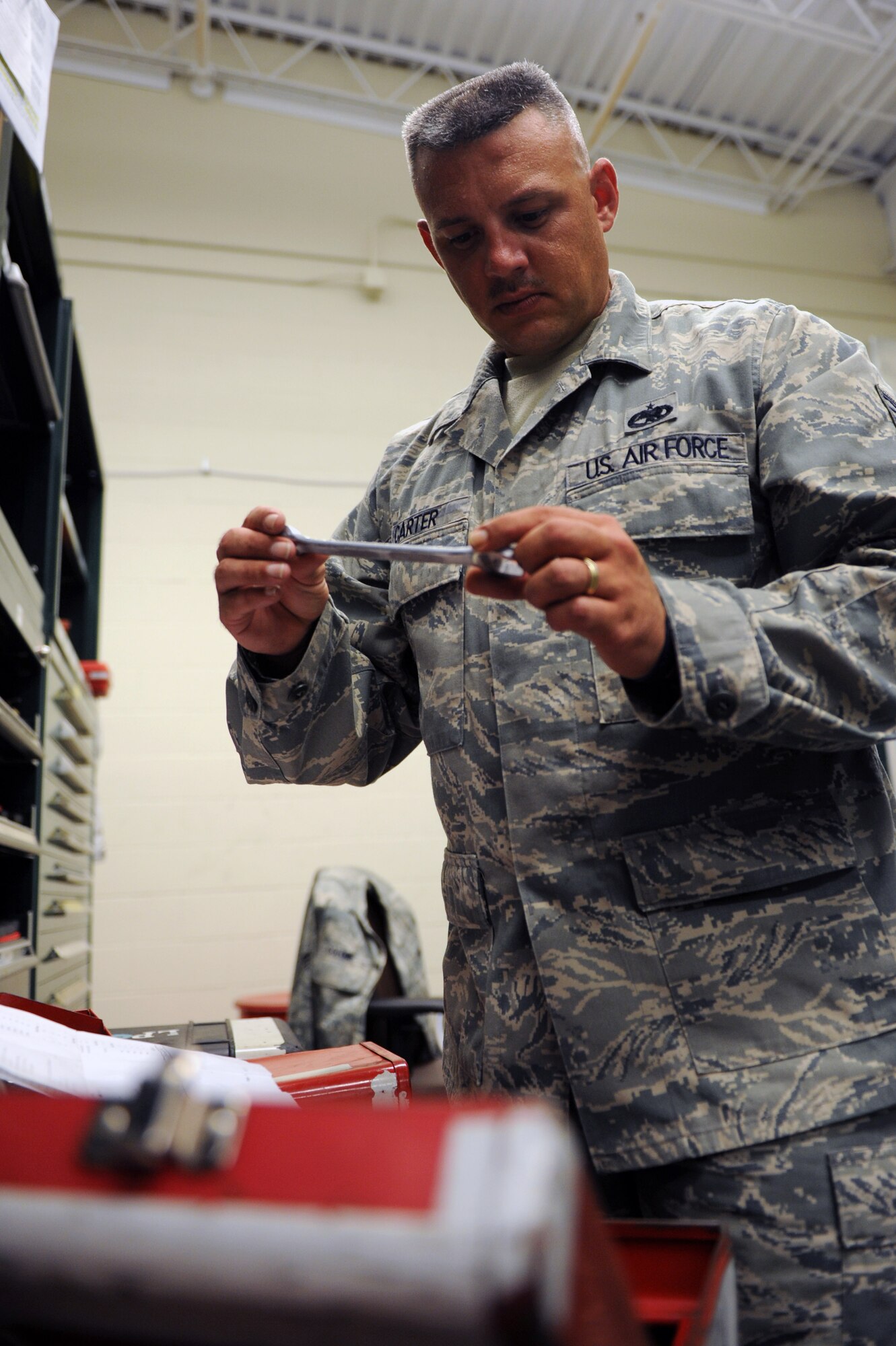 Tech. Sgt. Dwight Carter, a 19th Aircraft Maintenance Squadron aircraft maintenance unit consolidated tool kit section chief, inspects a tool kit Aug. 1, 2011, at Little Rock Air Force Base, Ark. The Leonardtown, Md., native was a leader of the Asset Accountability inspection team, which is responsible for 17 locations, helping the 19th Maintenance Group prepare for the upcoming Logistics Compliance Assessment Program inspection. (U.S. Air Force photo by Airman 1st Class Rusty Frank)