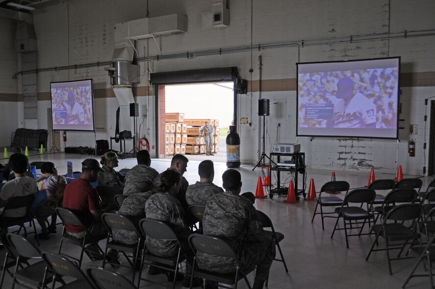 Airmen of the 148th Fighter Wing, Duluth, Minn, watch the Minnesota Twins play from the fuel cell while in Duluth, Minn. On August 7, 2011. Fox Sports North (FSN) and the Minnesota Twins supported the First Lady's "Joining Forces" campaign by celebrating military members and their families during a series of Sunday Twins Games where they will be airing their pre and post game shows from various military installations. (U.S. Air Force photo by Staff Sgt. Donald L. Acton)
