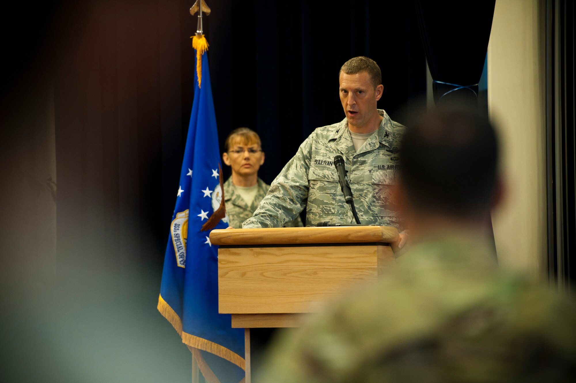 YOKOTA AIR BASE, Japan -- Col. Brad Sullivan, the new 353rd Special Operations Group commander, addresses the Pacific Air Commandos and other guests shortly after assuming command during a ceremony here Aug. 5. The ceremony was held at the Officers' Club here two days after Airmen and aircraft evacuated Kadena Air Base for Typhoon Mufia.  (U.S. Air Force photo by Staff Sgt. Sam Morse)
