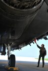KUNSAN AIR BASE, Republic of Korea -- Capt Sarah Odell, 494th Expeditionary Fighter Squadron F-15E Eagle Strike pilot, performs a pre-flight inspection on a F-15E here Aug. 5. RAF Lakenheath’s 494th Expeditionary Fighter Squadron is currently deployed to Kunsan as part of the theater support package and has been on station for approximately three months. (U.S. Air Force photo/Senior Airman Brittany Y. Bateman)